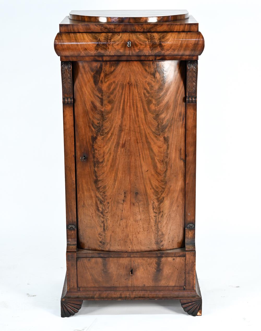 An antique Biedermeier cabinet in mahogany, c. 1870.