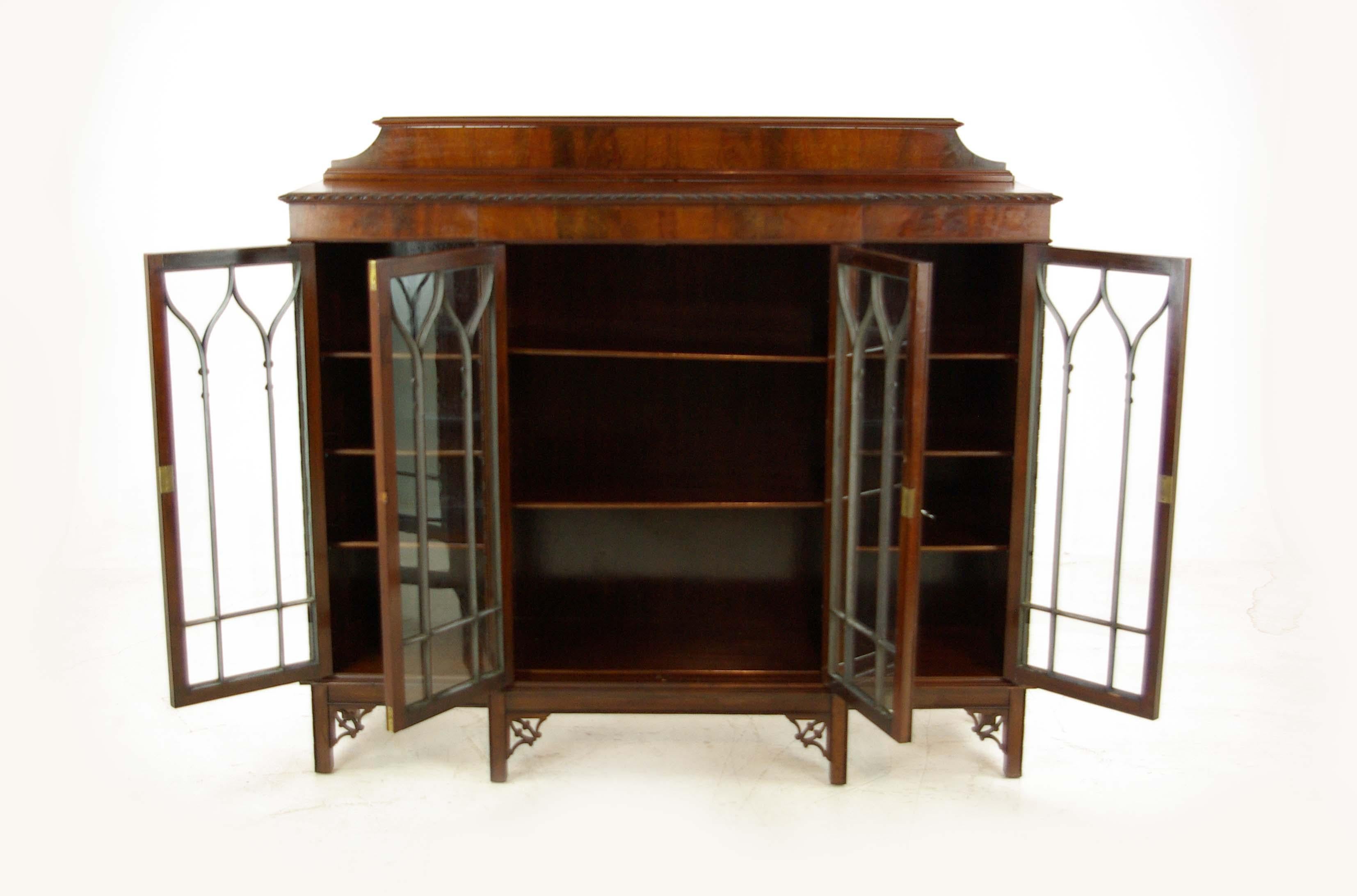 Antique Mahogany Bookcase, Breakfront Bookcase, Scotland 1900, Antique Furniture, B1026

Scotland 1900
Solid Mahogany with Original Finish
Raised Moulded Back Above a Break Front Top 
Gardooned Frieze
Underneath Four Astragal Doors
Working Locks and