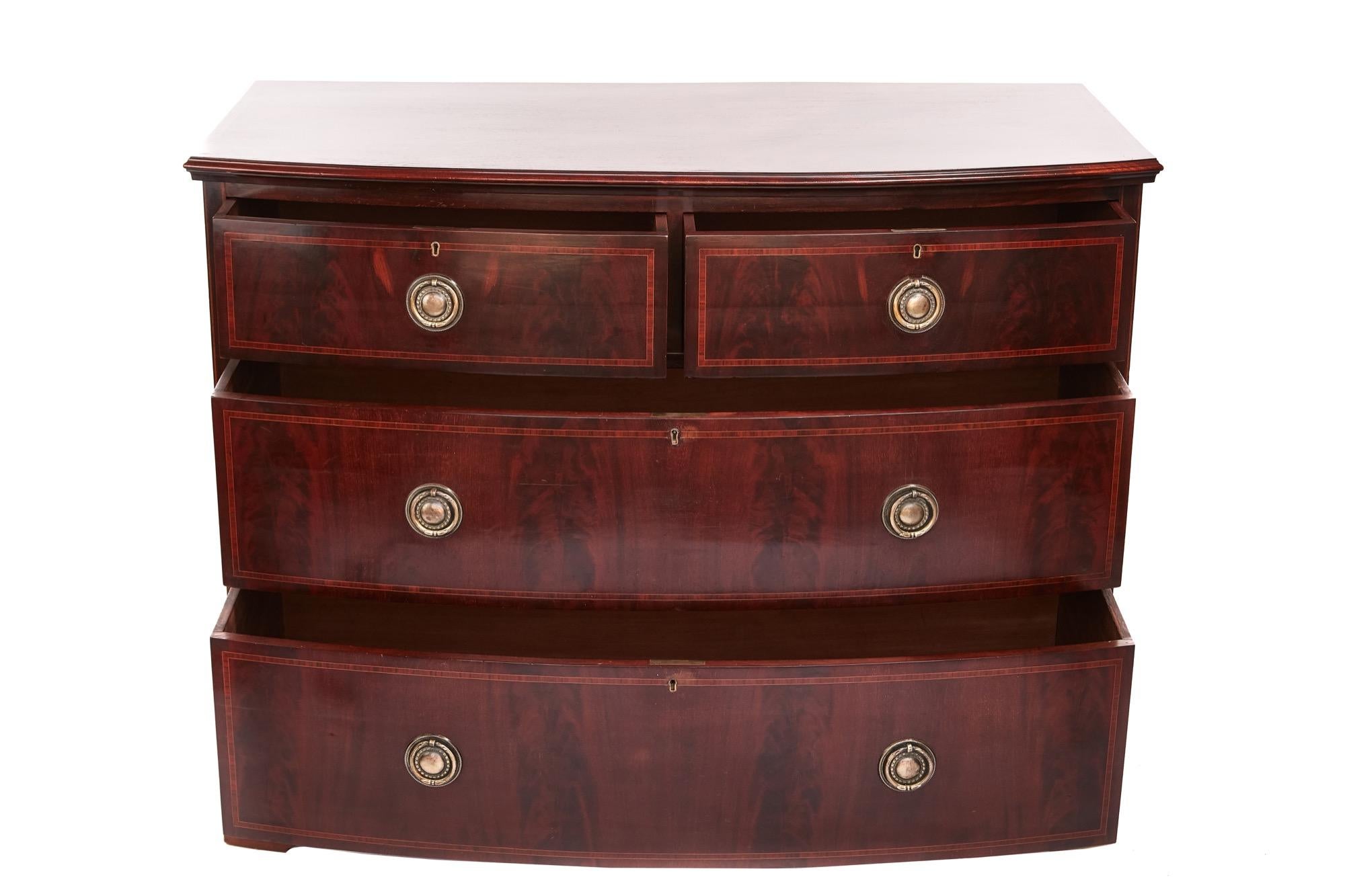 Antique mahogany bow front chest of drawers, having a lovely cross banded mahogany top, 2 short and 2 long drawers cross banded in satinwood with original brass handles standing on original bracket feet. Lovely colour quality and condition.