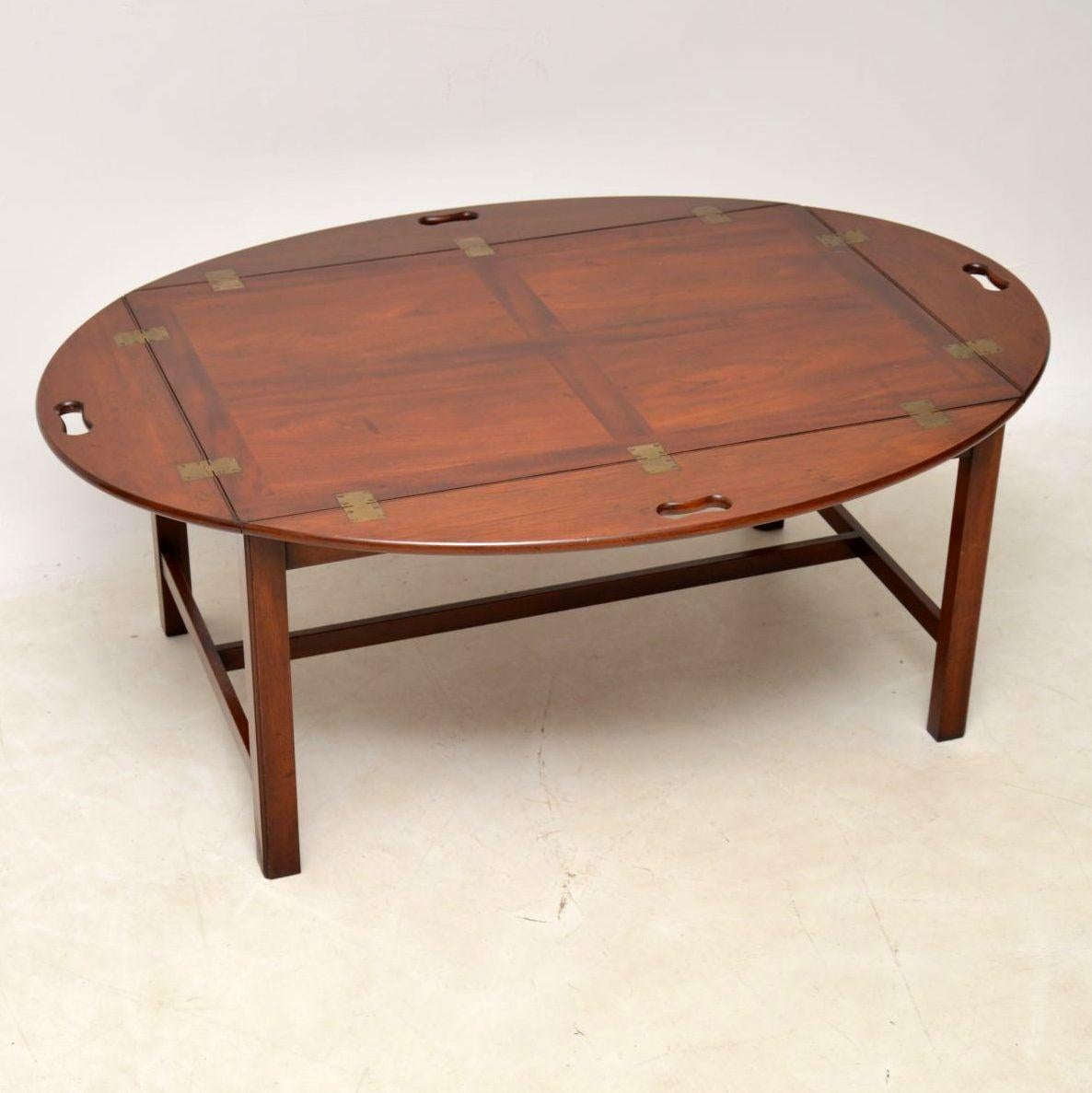 Large antique Georgian style Butlers tray top coffee table with a lift off top and dating to circa 1930s-1950s period. It’s in excellent condition and I can’t decide if it looks better with the flaps down, up or a bit of both. The tabletop has four