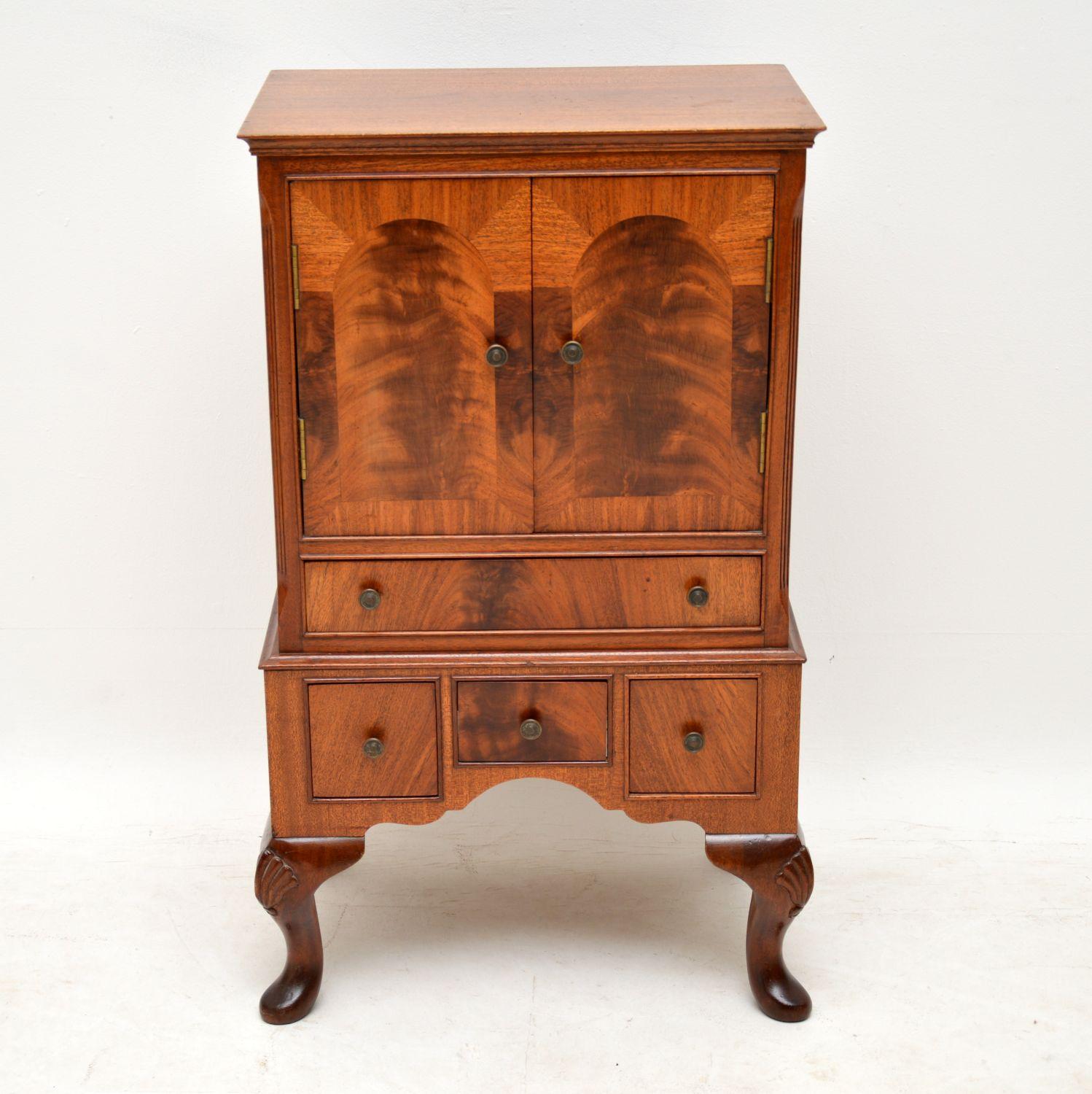 Small antique mahogany cupboard and chest of drawers combination in good condition and dating from around the 1920s-1930s period. This is a very useful small compact piece of furniture and could be used in many places the home. The two cupboard
