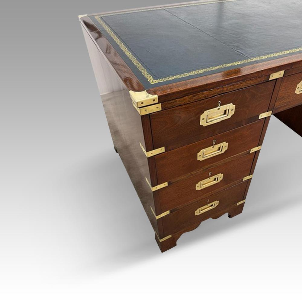 Military campaign desk
This large Military campaign desk was made in the last quarter of the 19th century.
It is made of mahogany with brass inset corners and flush brass handles.
The top has the gilt tooled leather writing surface, that makes for a