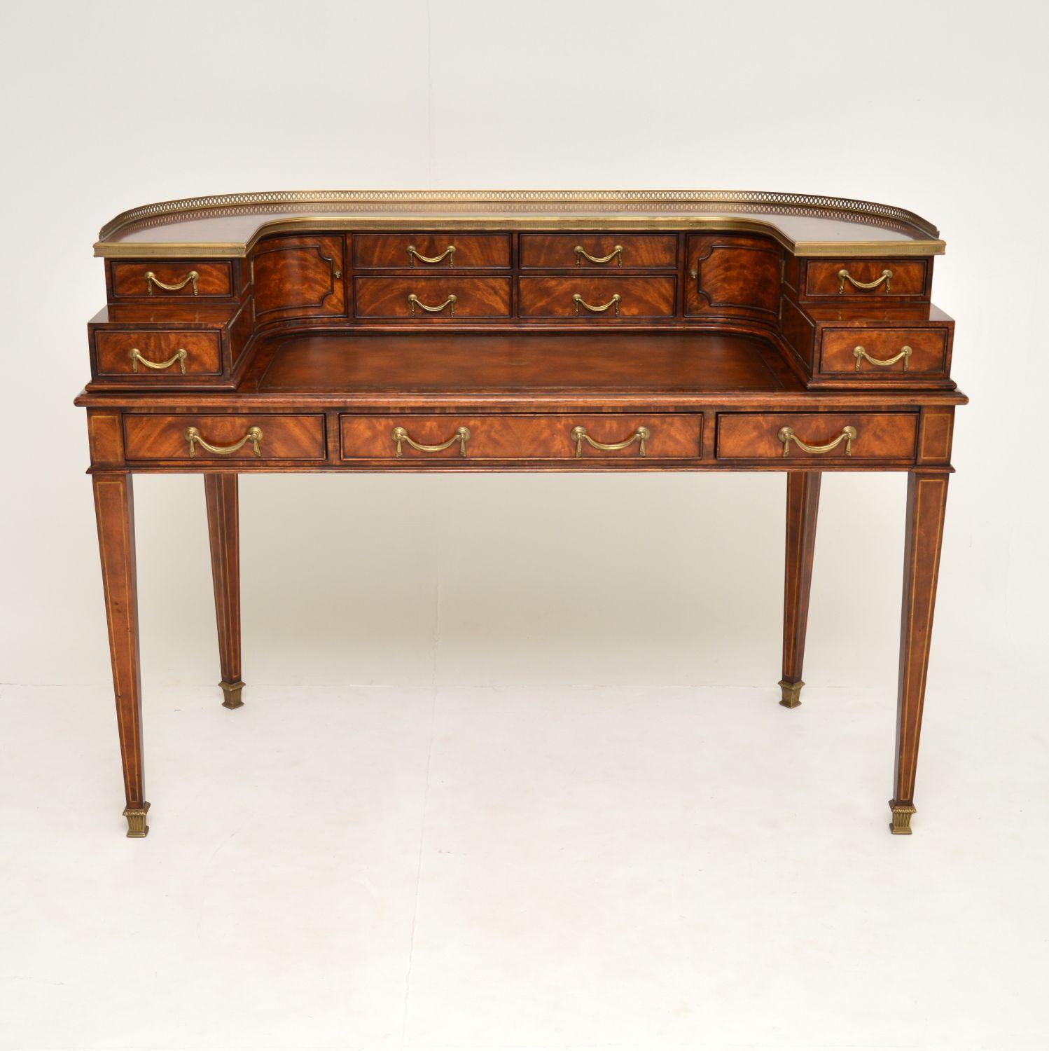 A magnificent Carlton house desk, beautifully made from mahogany, leather and brass. This dates from the late 20th century, it was part of a prestigious Althorp collection by Theodore Alexander.

It was inspired by the furniture from Althorp, the