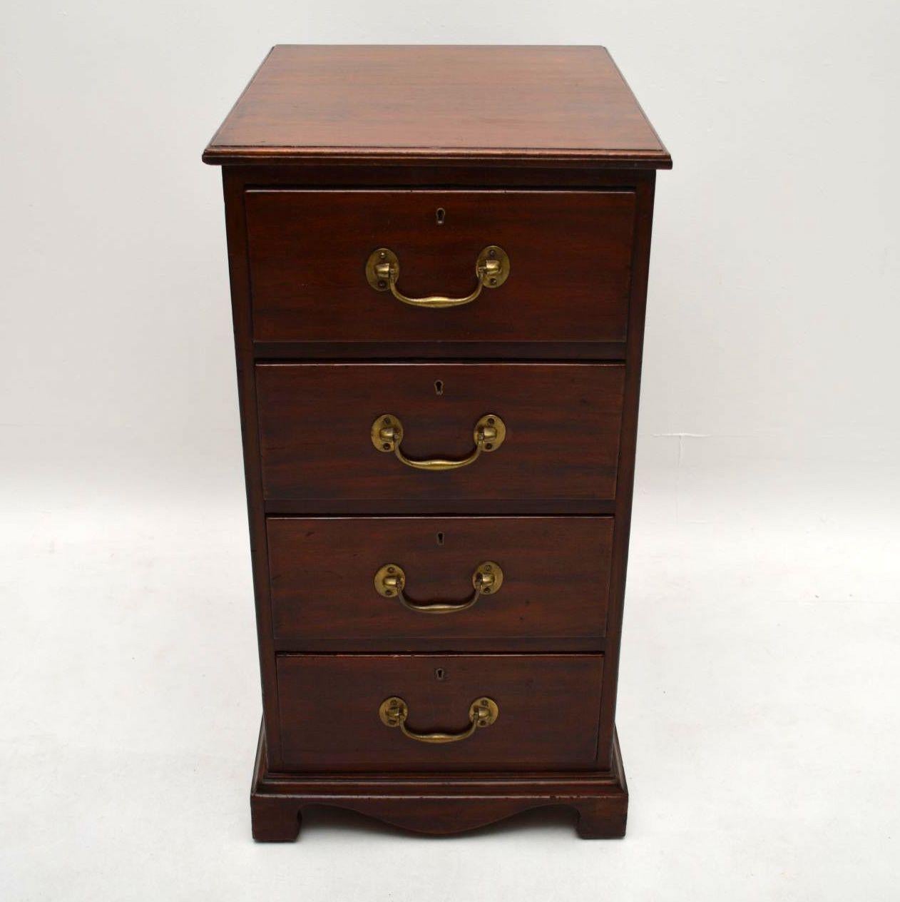This antique mahogany chest of drawers has quite slim and deep proportions, almost like a filing cabinet size. In fact maybe it was a filing cabinet. It’s in good original condition and is Georgian in style, dating from circa 1890-1910 period. There
