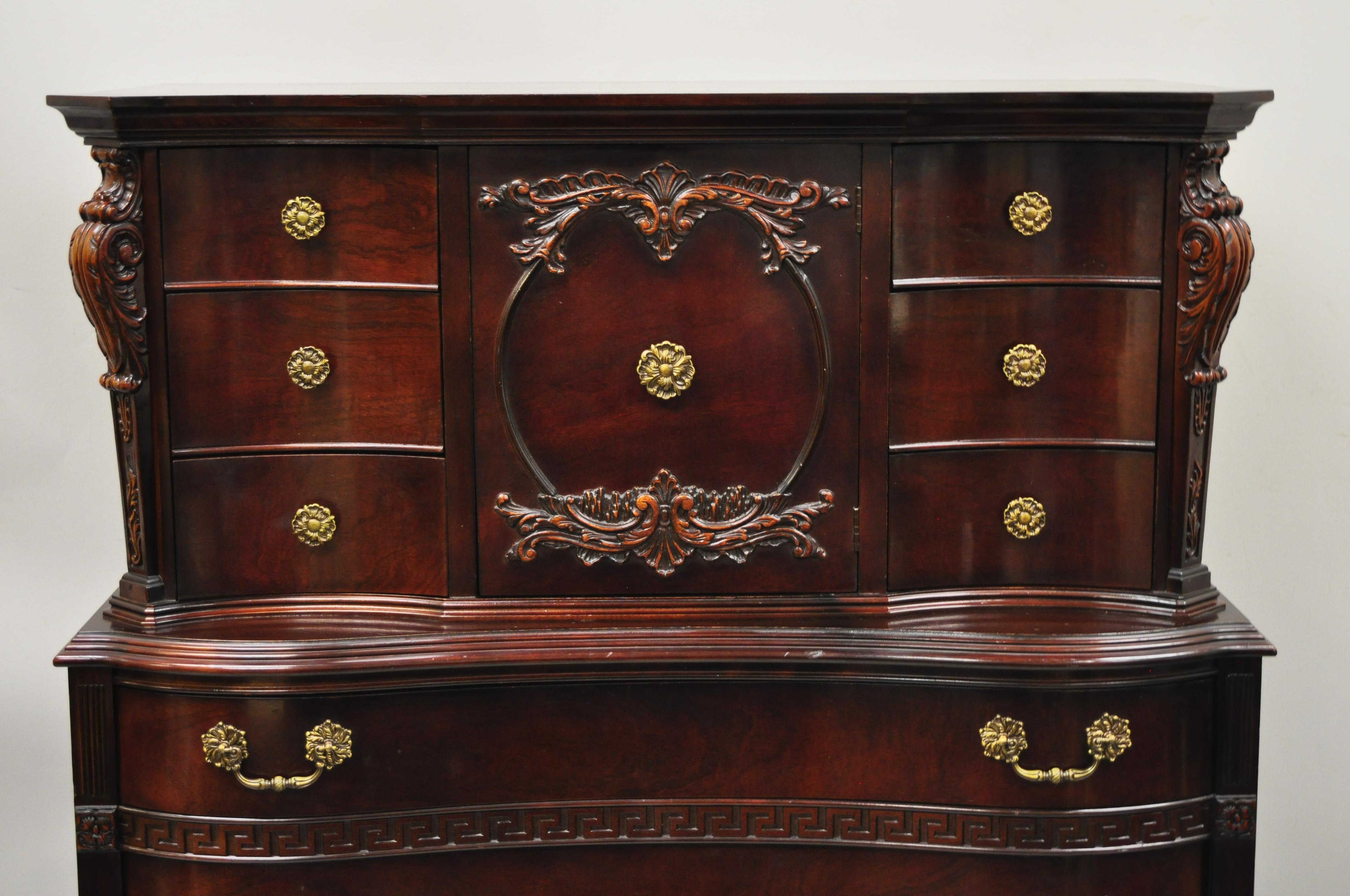 Antique Mahogany Chinese Chippendale style Hollywood Regency Chest Dresser Cabinet. Item features cedar lined drawer, solid wood construction, beautiful wood grain, nicely carved details, 1 swing doors, 10 dovetailed drawers, very nice antique item,