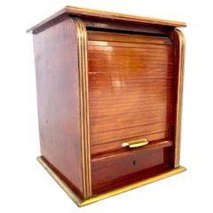 Antique mahogany cigar box with a humidor and tambour sliding door