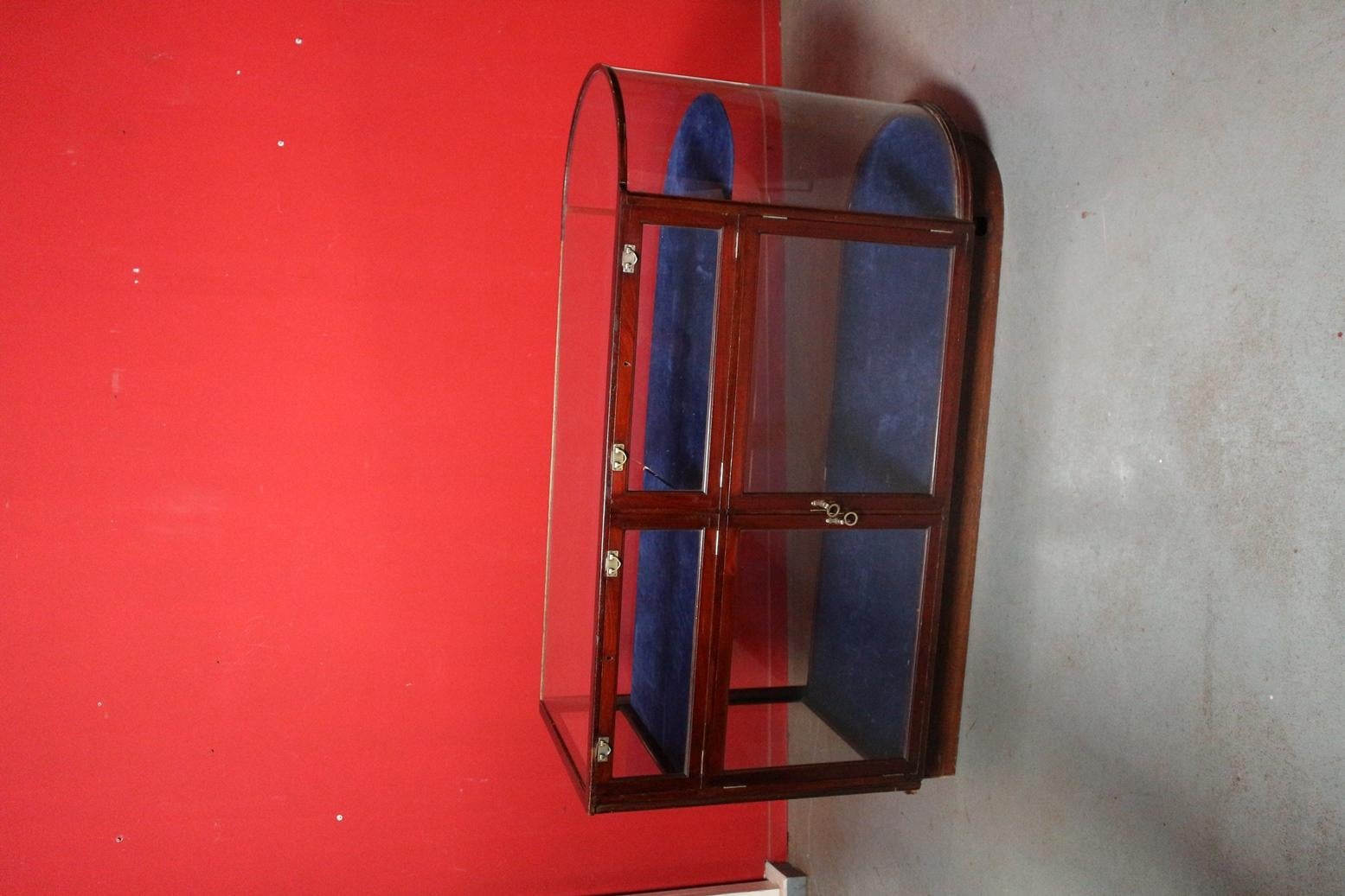 antique curved glass display case