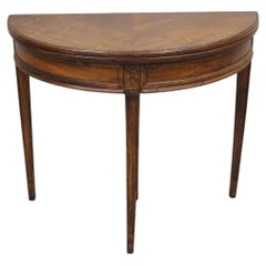 Mesa de juegos antigua de caoba, tipo «demilune», con tapa abatible y cajón oculto