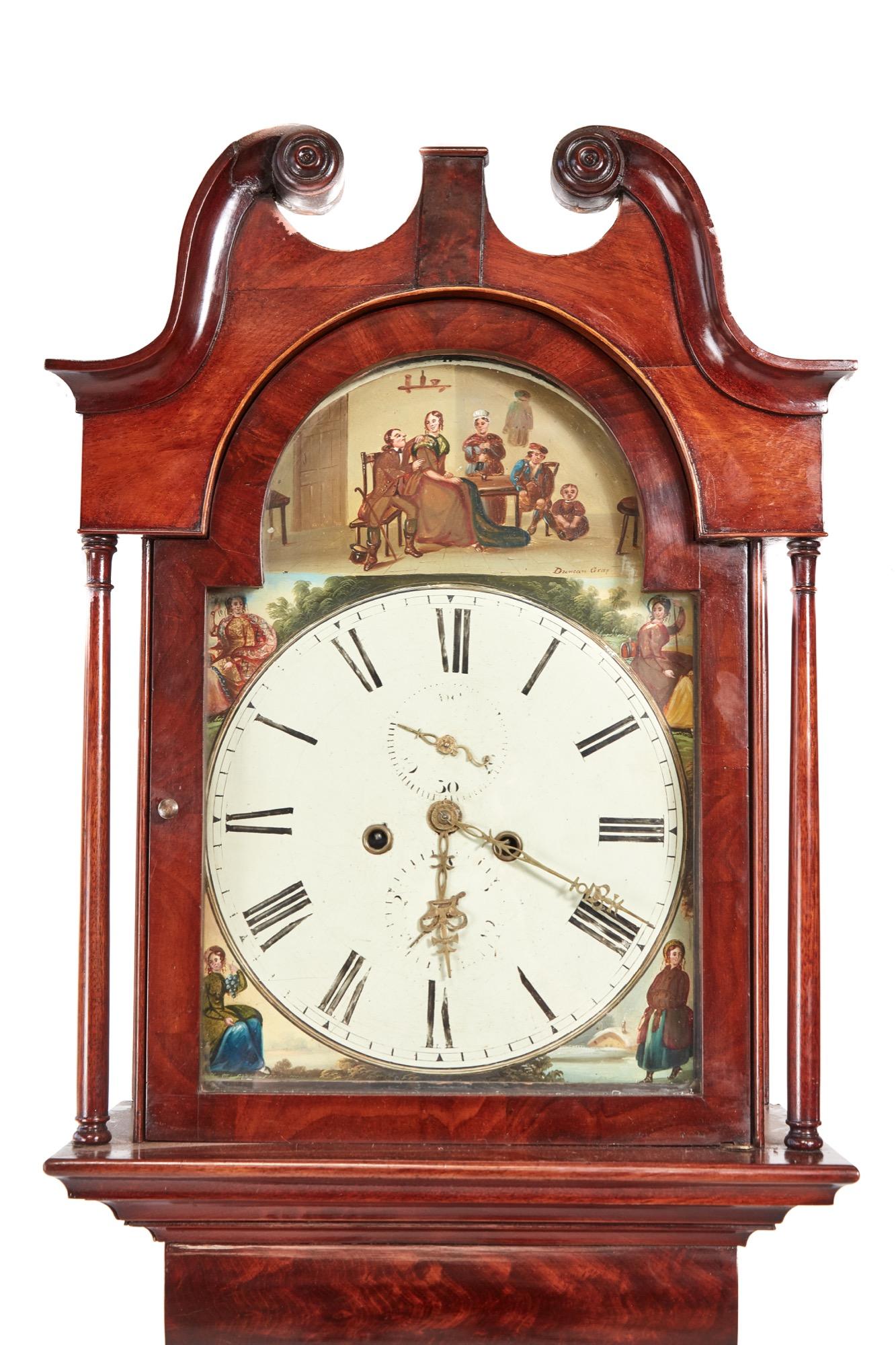Antique mahogany eight day long case clock, the hood with a swan neck pediment, lovely decorative and colorful painted dial with date and seconds dial, eight day duration mechanism striking the hour on a bell, lovely flame mahogany case standing on