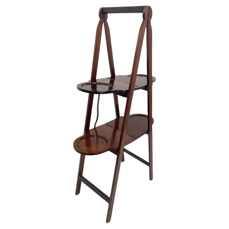 Soporte plegable de caoba antiguo para servir