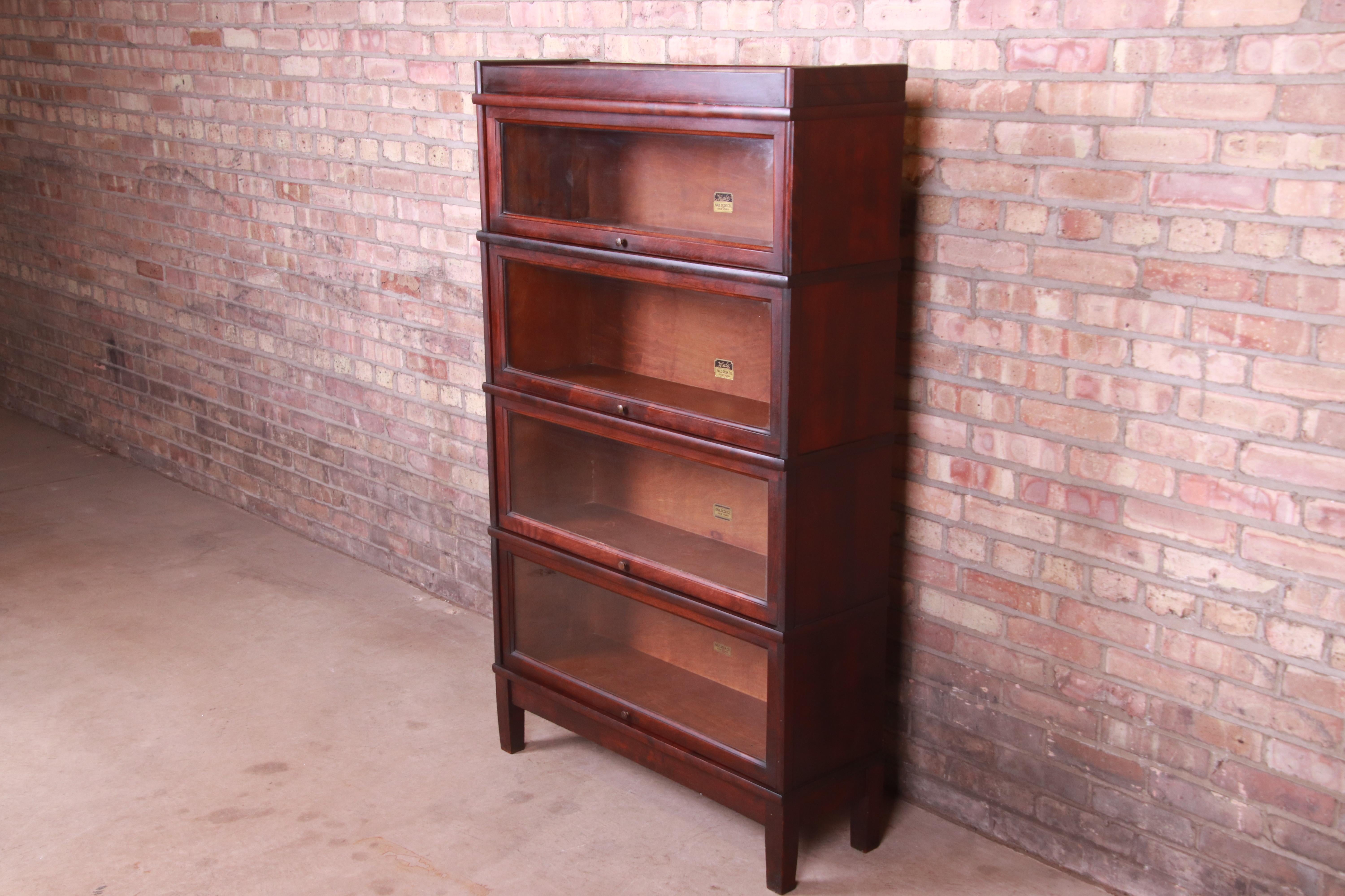 A gorgeous antique mahogany four-stack barrister bookcase

By Hale

USA, Circa 1920s

Measures: 34.25