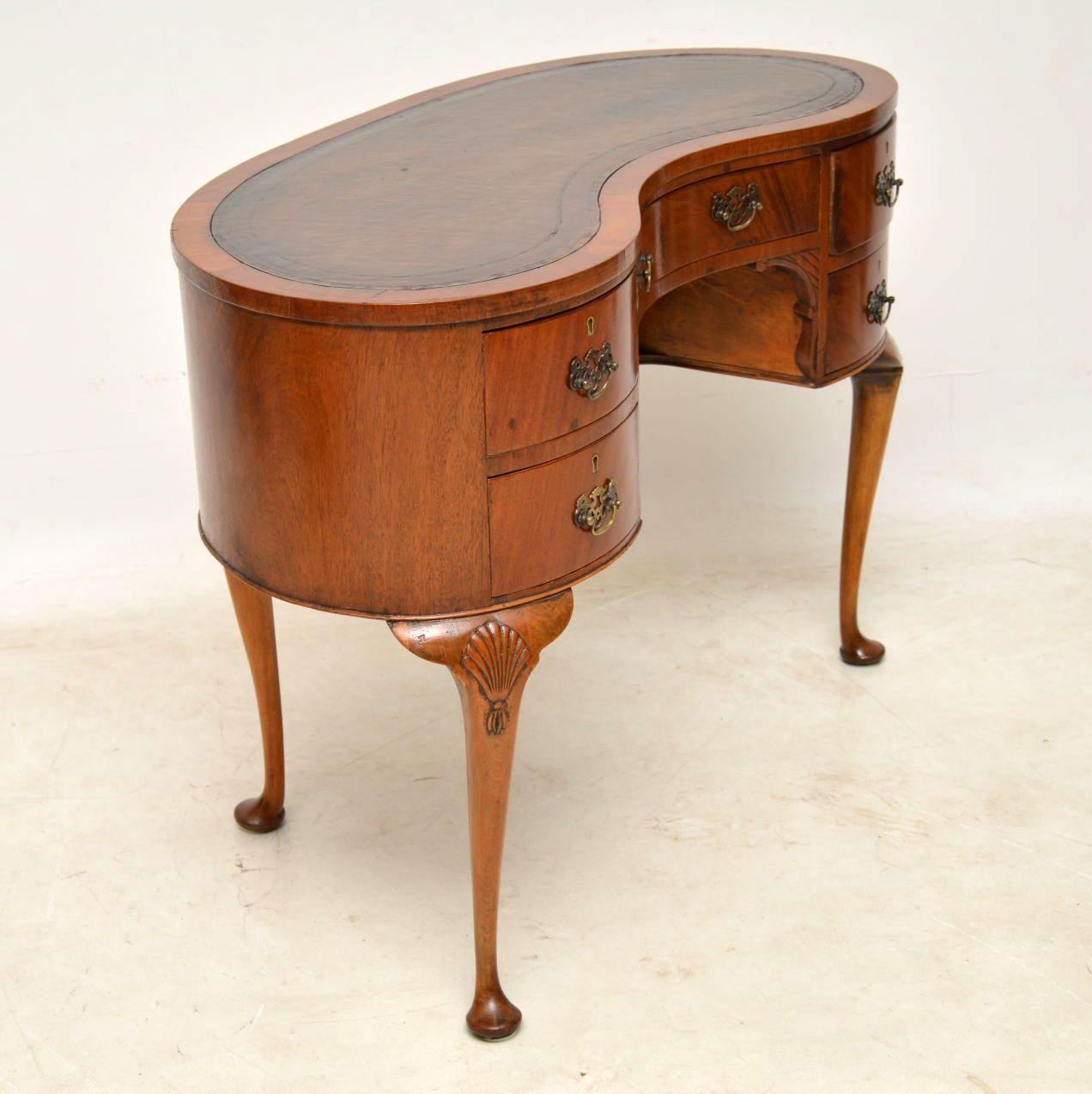 antique kidney shaped desk leather top