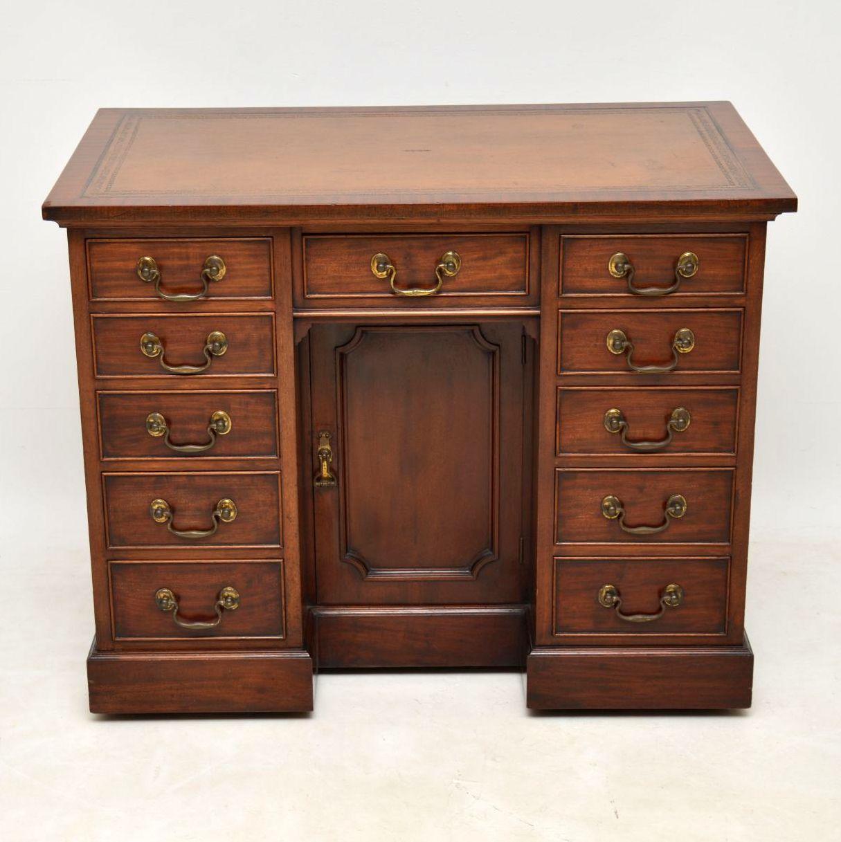 This small antique mahogany kneehole desk is fabulous quality and has quite a lot of age. At first it looks George III & I would like to say it is. However I would say it dates from circa 1890-1910 period and it’s in very good condition. The tooled