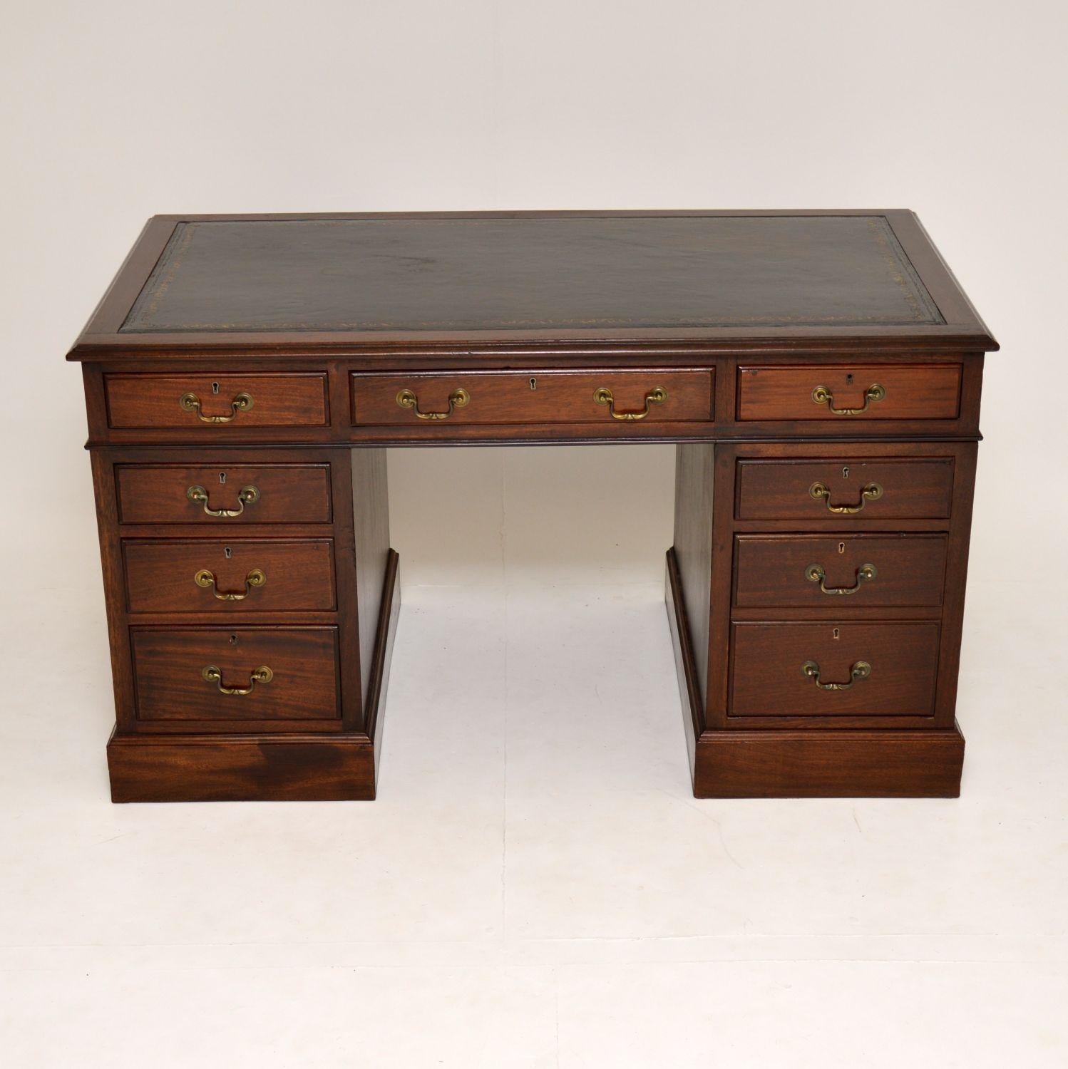 This antique pedestal desk is really good quality and is solid mahogany, with a finished polished back. It’s in excellent condition and I would date it to circa 1910 period. It lifts apart into three sections for easy transportation. The bottom