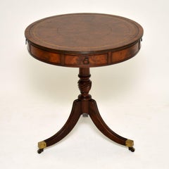 Ancienne table tambour tournante à dessus en cuir en acajou