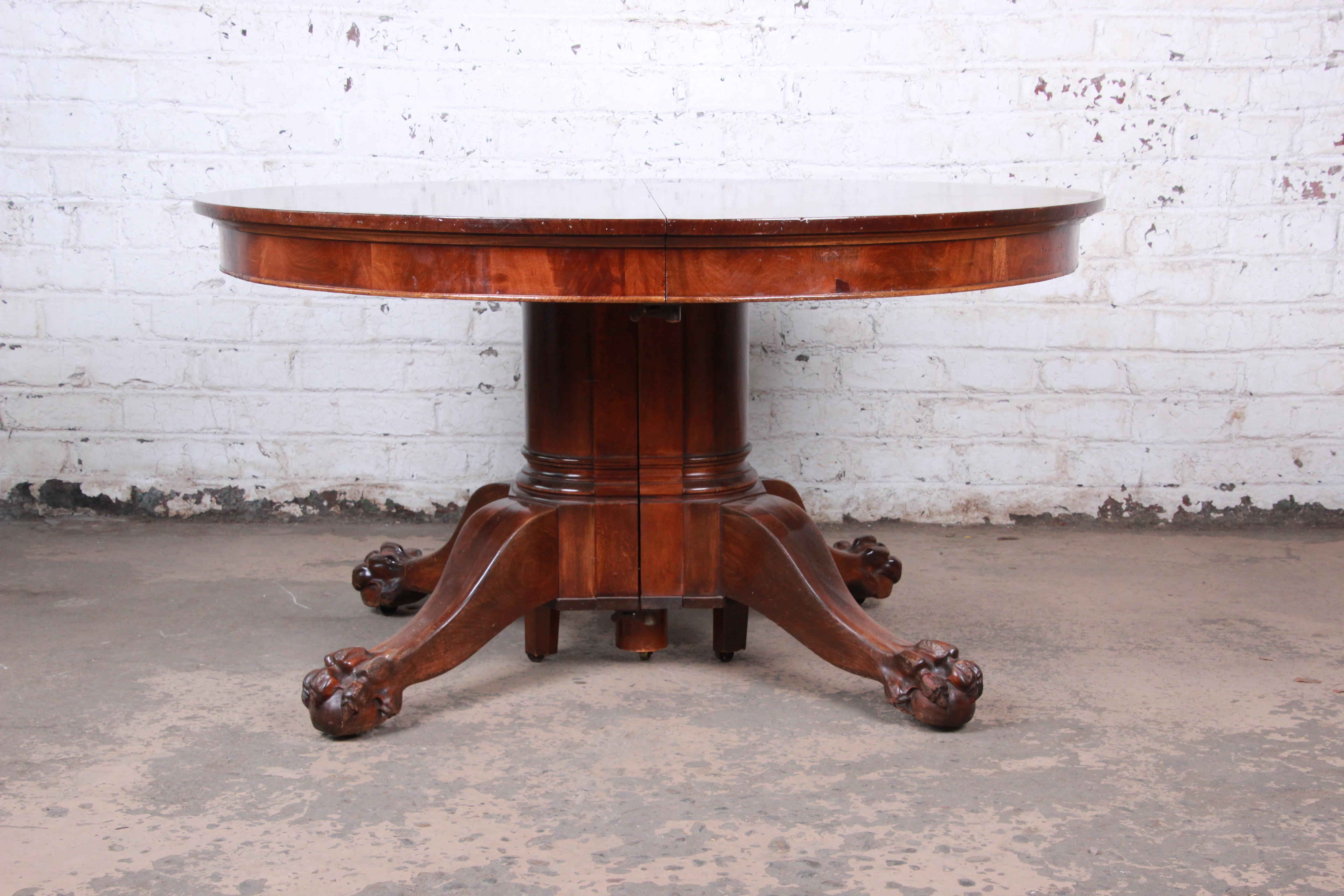Antique Mahogany Pawfoot Pedestal Extension Dining Table with Eight Leaves 1