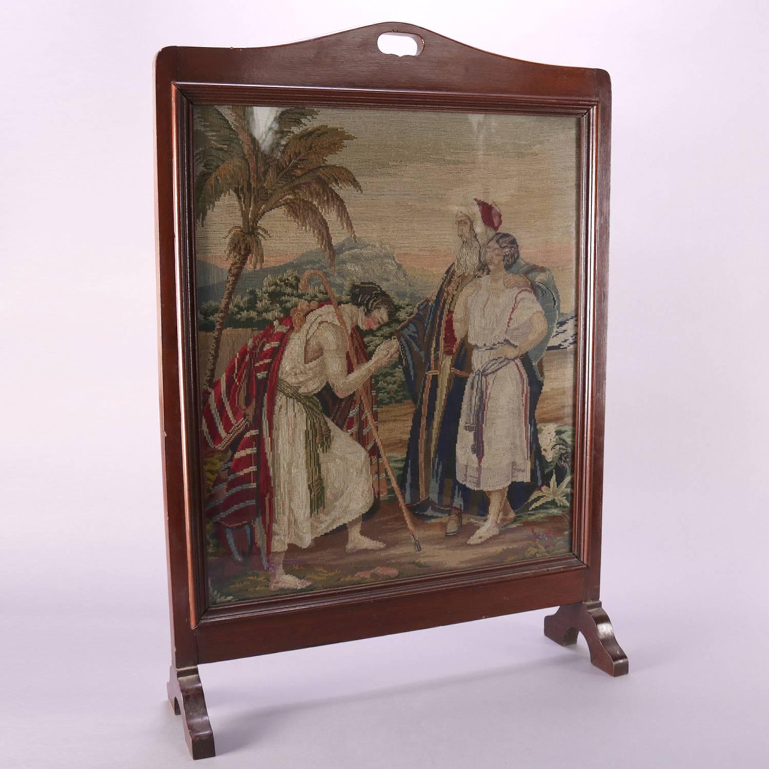 Antique Victorian fire screen features mahogany frame housing pictorial needlepoint depicting Biblical Old Testament account of Laban’s giving of Leah (or later Rachel) to Jacob to marry(Bible, Genesis Chapter 29), circa 1890


Measures: 35