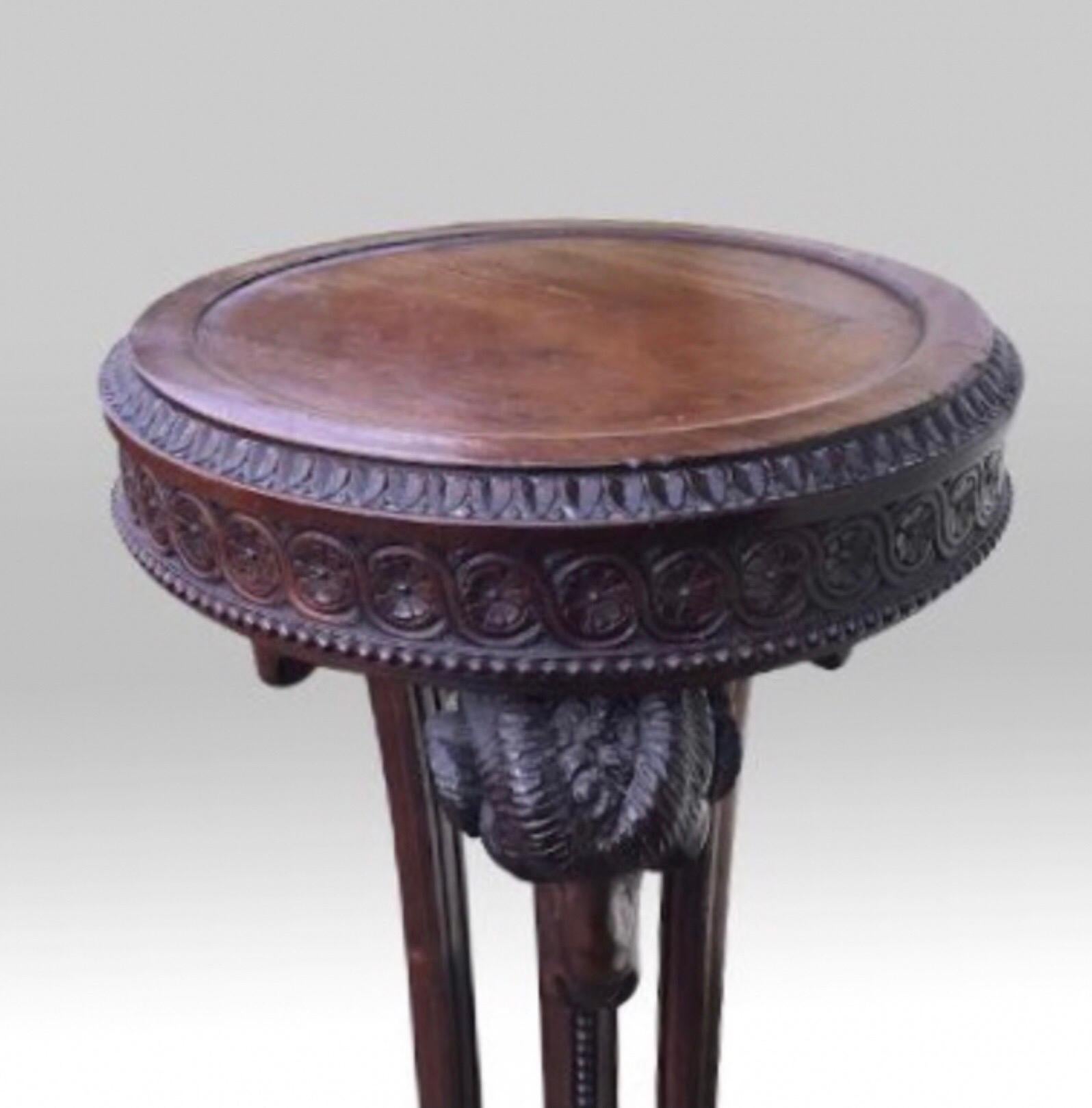 Superb Quality antique Mahogany Regency design Torchere, plant stand,
Exquisitely carved with rams heads and rams feet 
Circa 1900.
   
