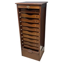 Antique mahogany roll-top filing cabinet with 10 drawers