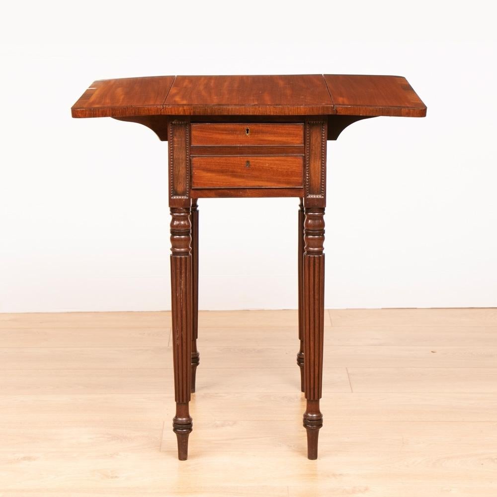 An antique Gillows side table with mahogany and rosewood crossbanding, drop leafs and double ended drawers, circa 1800-1820.
Spotlight  Georgian Period, 1714-1837
The word Georgian is synonymous with exceptional quality and design, thanks in part to