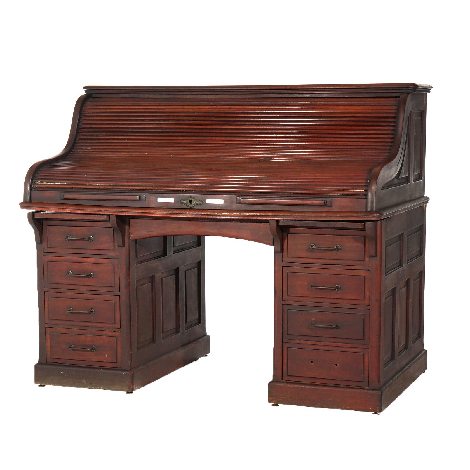 An antique desk by Gunn offers paneled mahogany construction with s-roll top opening to full interior, purportedly owned by notable sea captain John Craig, maker label as photographed, c1850

Measures - 49.75