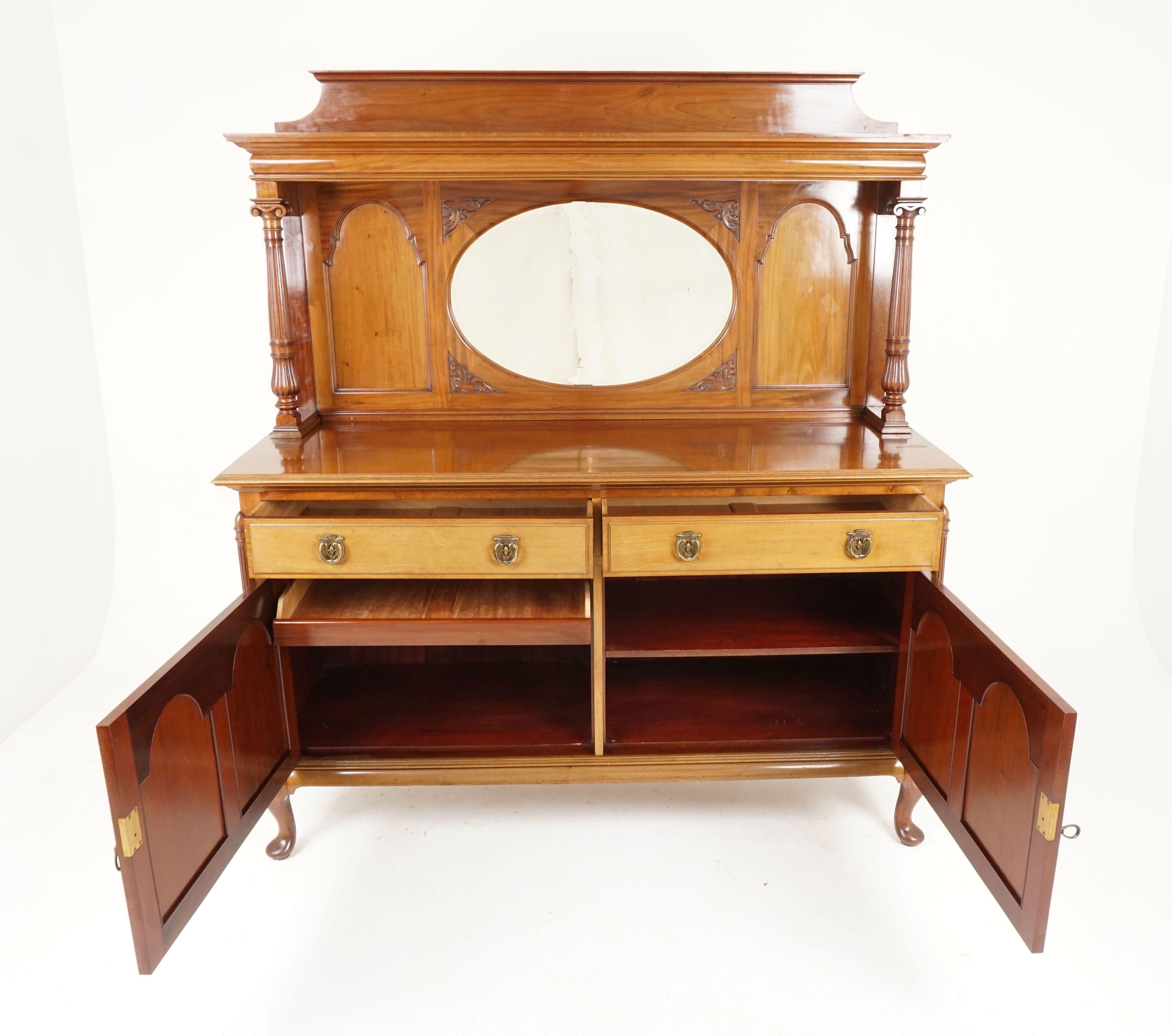 Antique Walnut sideboard, mirror back, carved Art Nouveau buffet, Scotland 1920, H134

Scotland 1920
Solid Walnut
Original finish
The gallery back has a top shelf
Held up by a pair of carved turned columns
The back has an oval beveled glass mirror