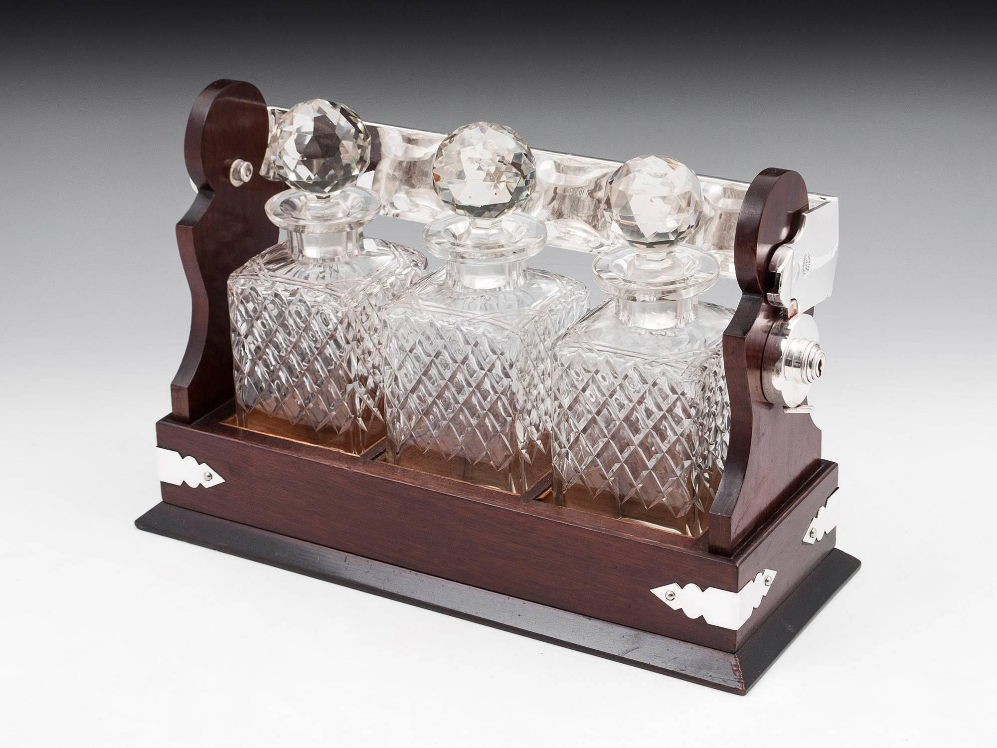 Antique Mahogany Silver-Plate Three Bottle Crystal Glass Tantalus, 20th Century In Good Condition In Northampton, United Kingdom