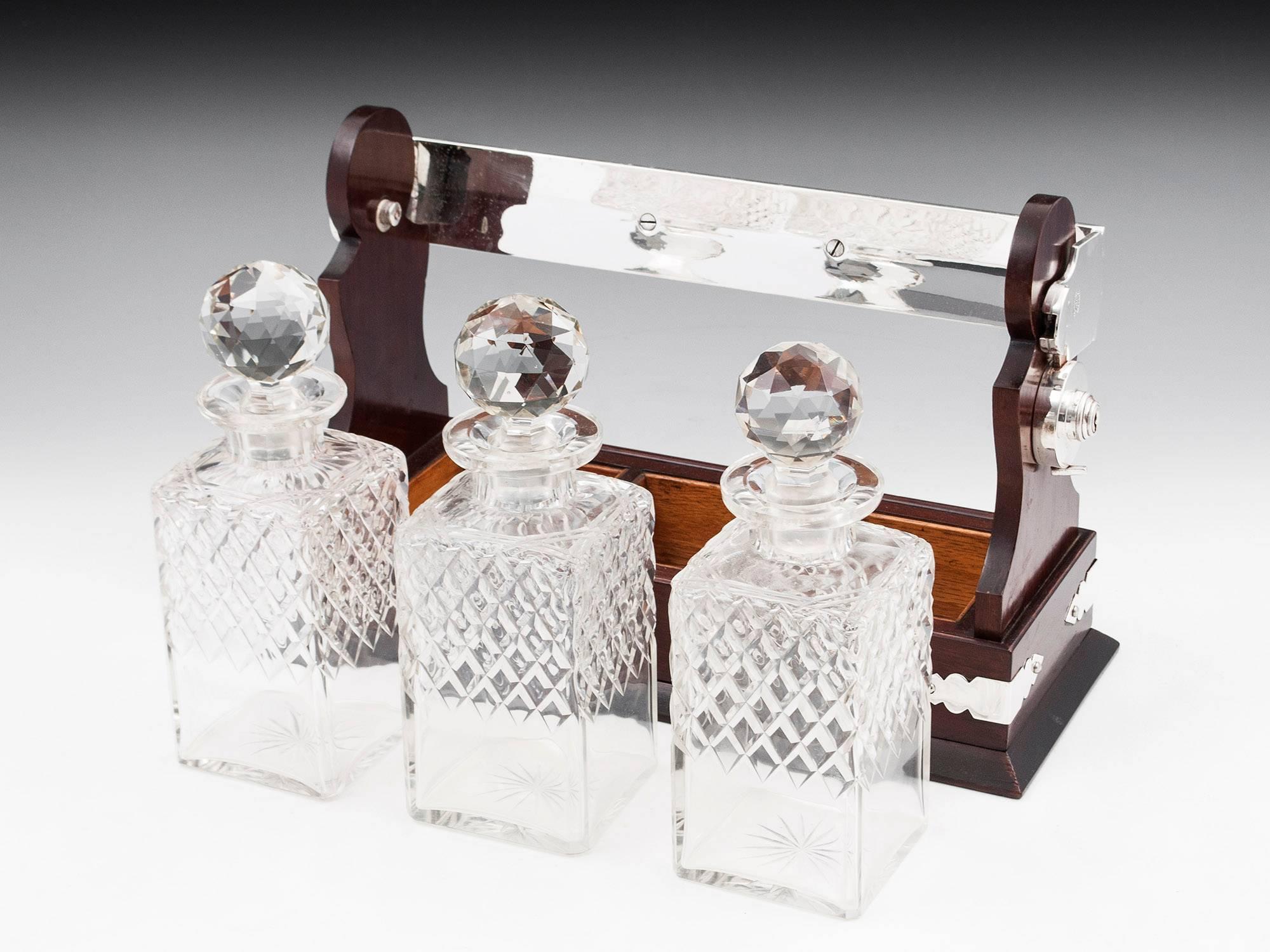 Silver Plate Antique Mahogany Silver-Plate Three Bottle Crystal Glass Tantalus, 20th Century