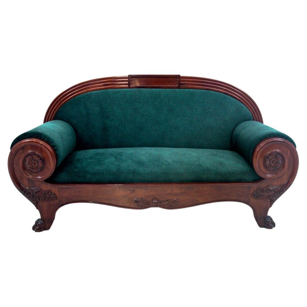 Antique mahogany sofa from Northern Europe, around 1880. For Sale
