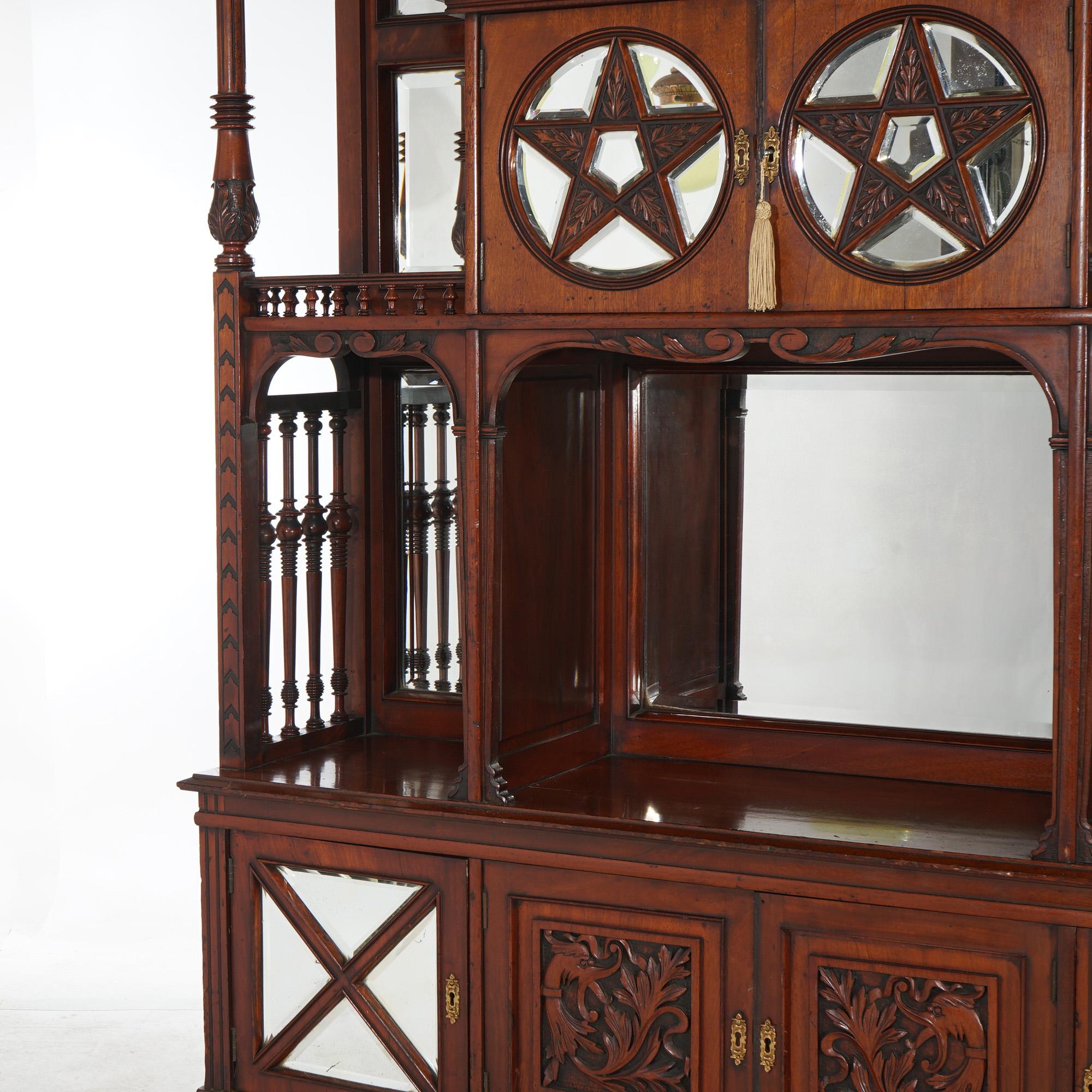 ***Ask About Reduced In-House Delivery Rates - Reliable Professional Service & Fully Insured***
Antique Mahogany Star Pentagram Etagere with Foliate Carved Pediment, Cabinets with Beveled Mirrors, Spindled Galleries & Lower Cabinets with Stylized