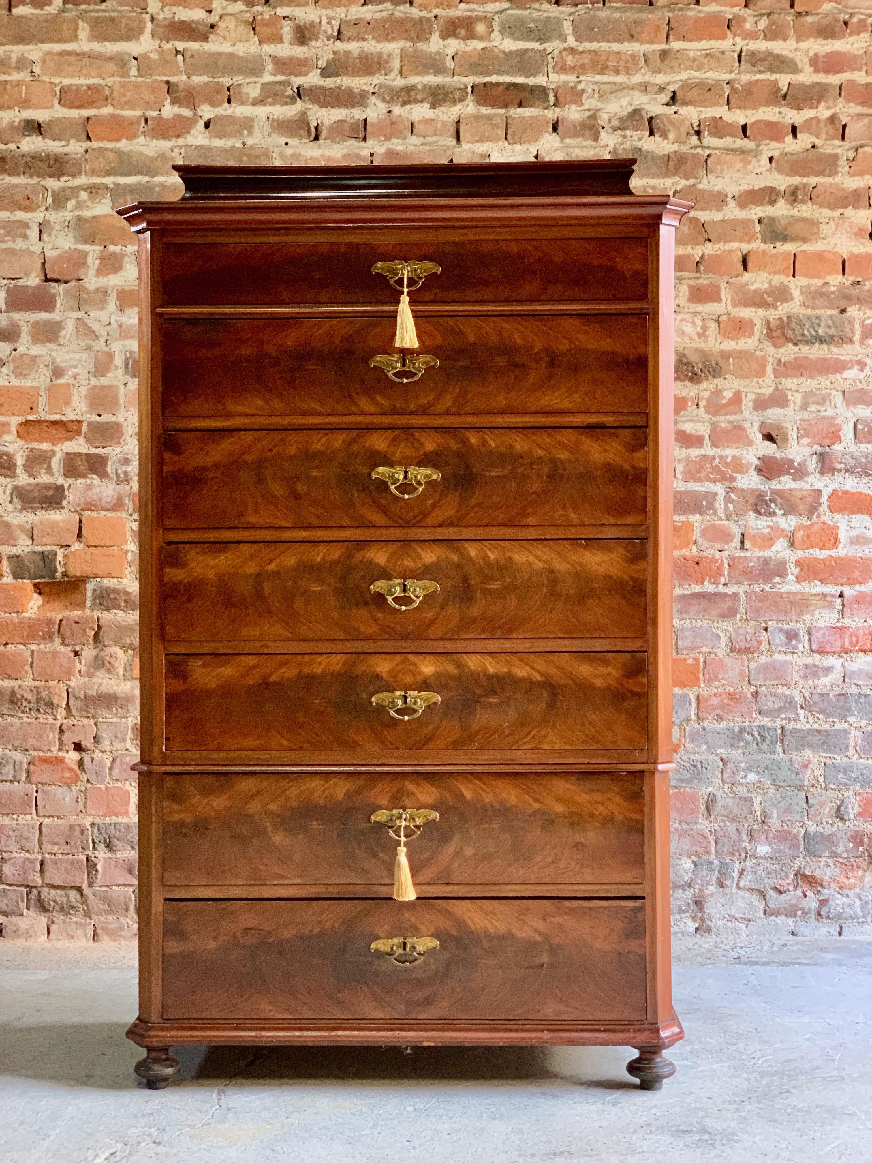 Antique Mahogany Tallboy Chest of Drawers 19th century Danish Biedermeier style

Magnificent Antique 19th century Danish Flame fronted Mahogany Tallboy chest of drawers in the Biedermeier style circa 1880, the canted top over seven graduated