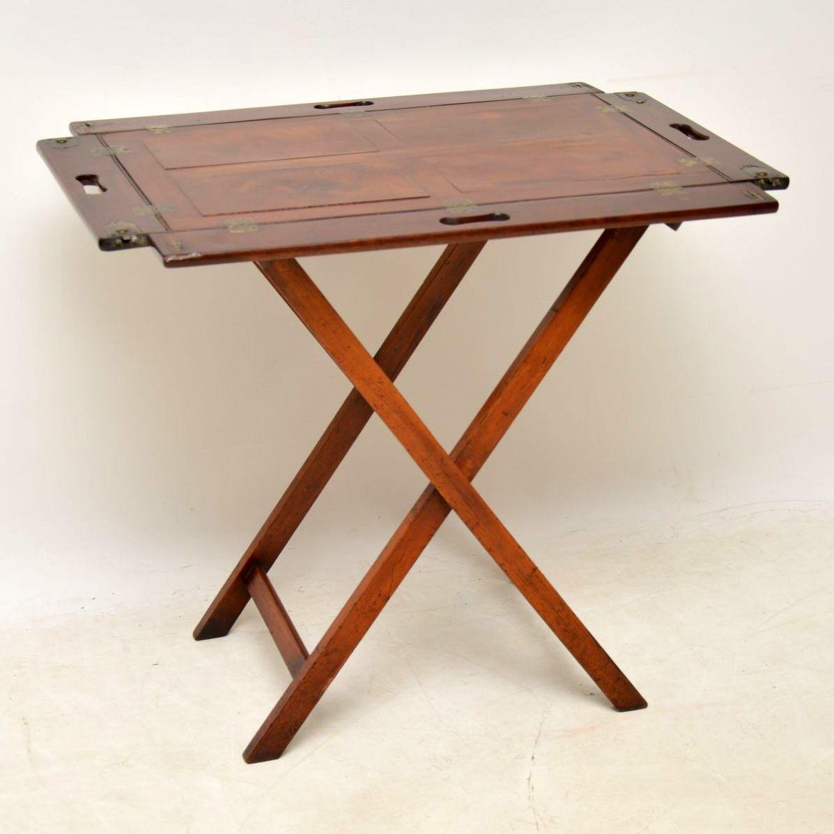 This antique mahogany tray top butlers stand is very old and I think it dates from the 1790s period. Like most of these examples it’s hard to work out whether the top and the fold up legs started off together, but they do look right together. All