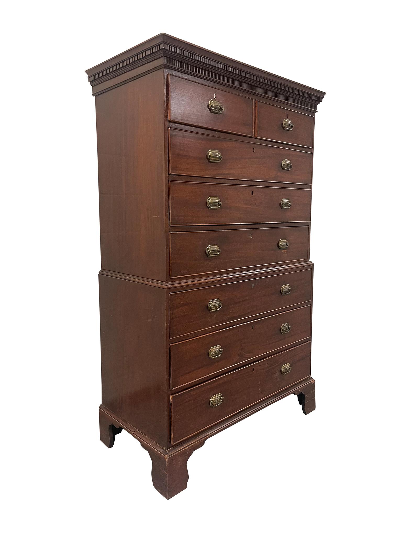 Handsome Antique Mahogany Two-Piece Chest of Drawers, attributed to be from the George III period. Crafted in solid, high quality mahogany, the chest on chest features 5 top drawers and three separated bottom drawers. Designed with bracket feet,