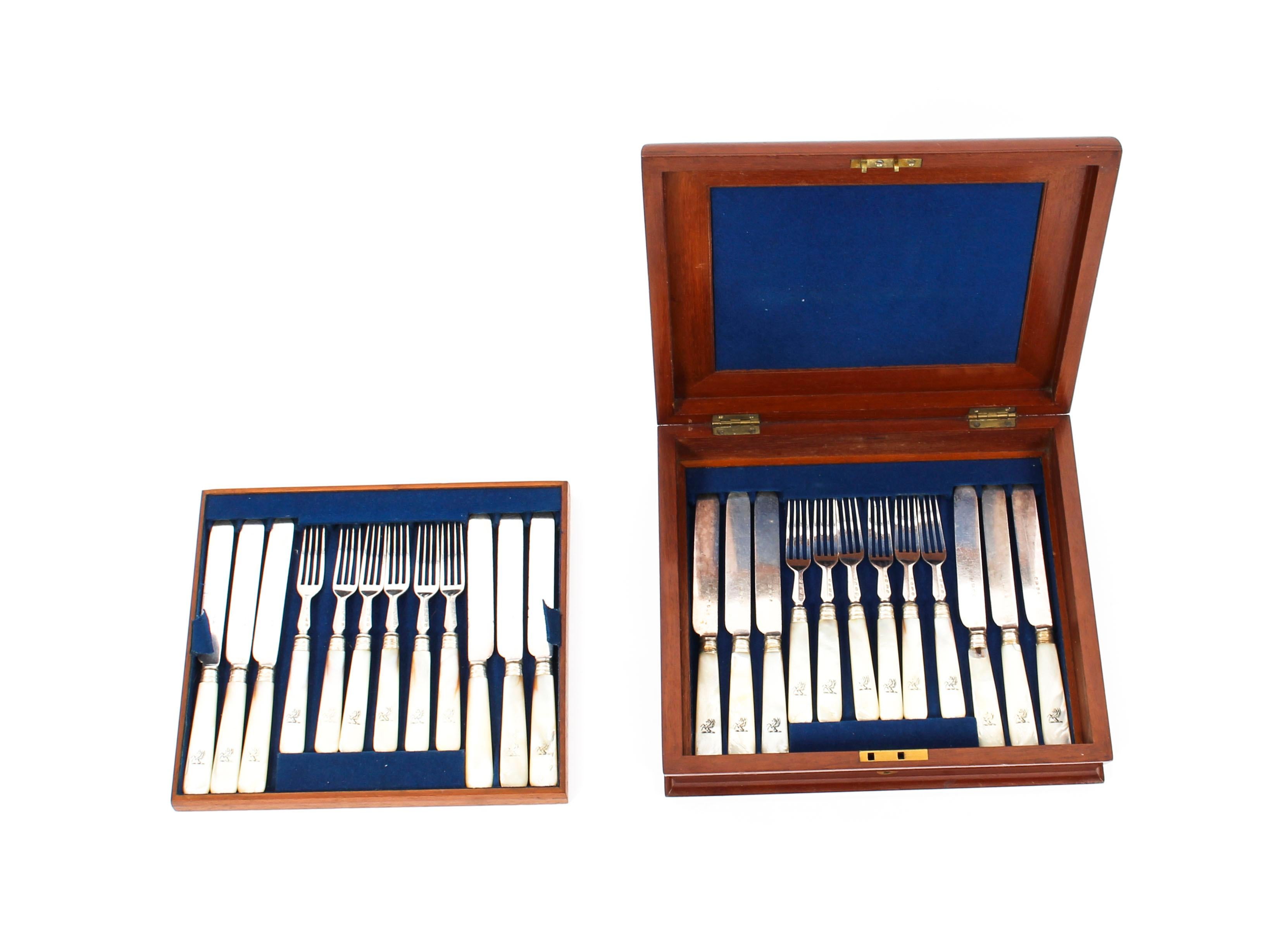 This is a beautiful mahogany two-tier cased set of silver plated and mother of pearl handled dessert knives and forks, circa 1850 in date.

The set is designed in an elegant and elaborate pattern and comprises twelve dessert knives and twelve