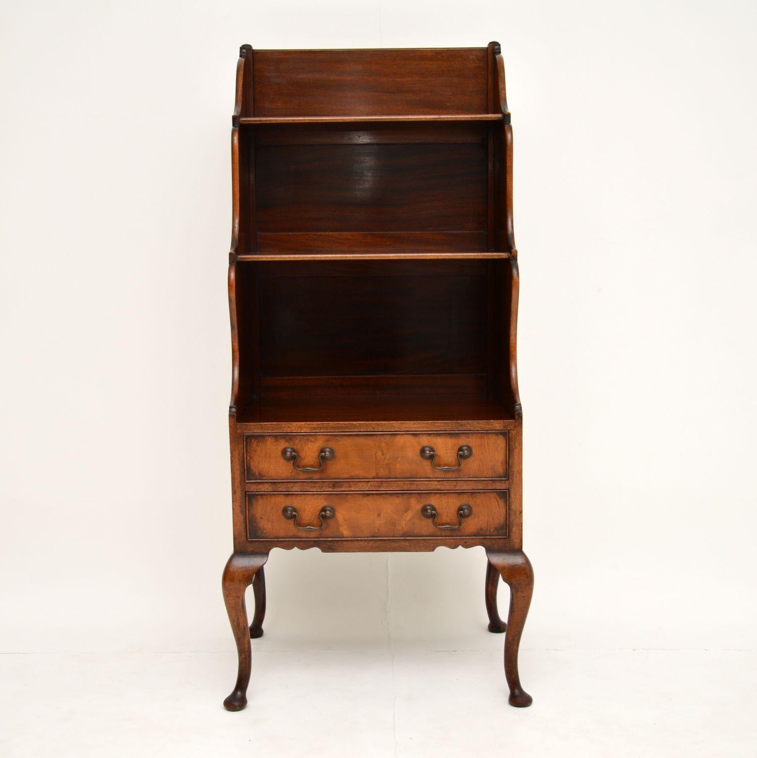 A top quality antique cascading waterfall bookcase in mahogany. This dates from circa 1890-1900 period.

This is very well made, full of character and is of a great size. The drawers are solid oak lined with extremely fine dovetails, this has