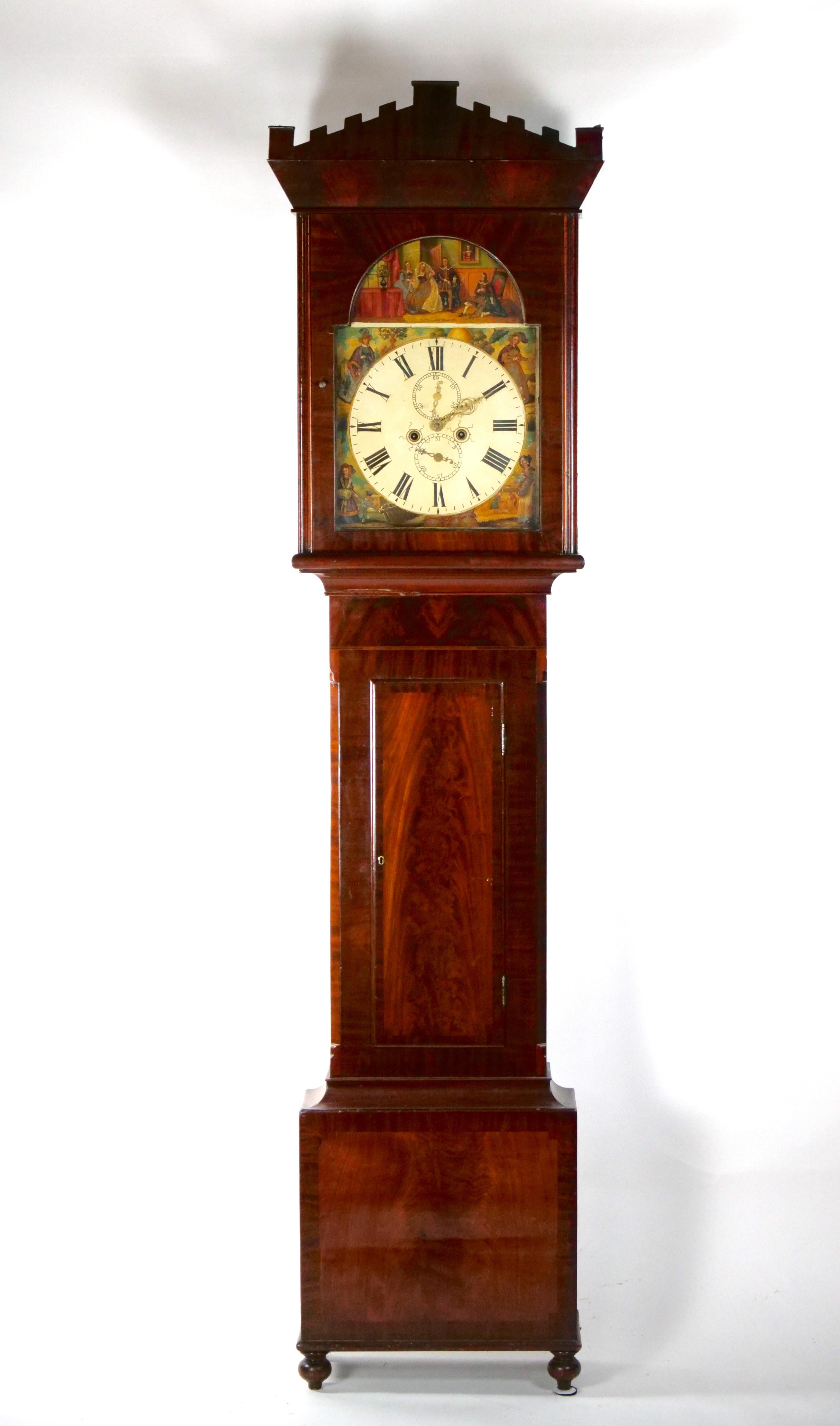 Outstanding craftsmanship and beautifully crafted in mahogany and features numerous details that make this a desirable timepiece. From the hand carved decorated top pediment with its clean line mahogany wood supports to the satinwood inlaid