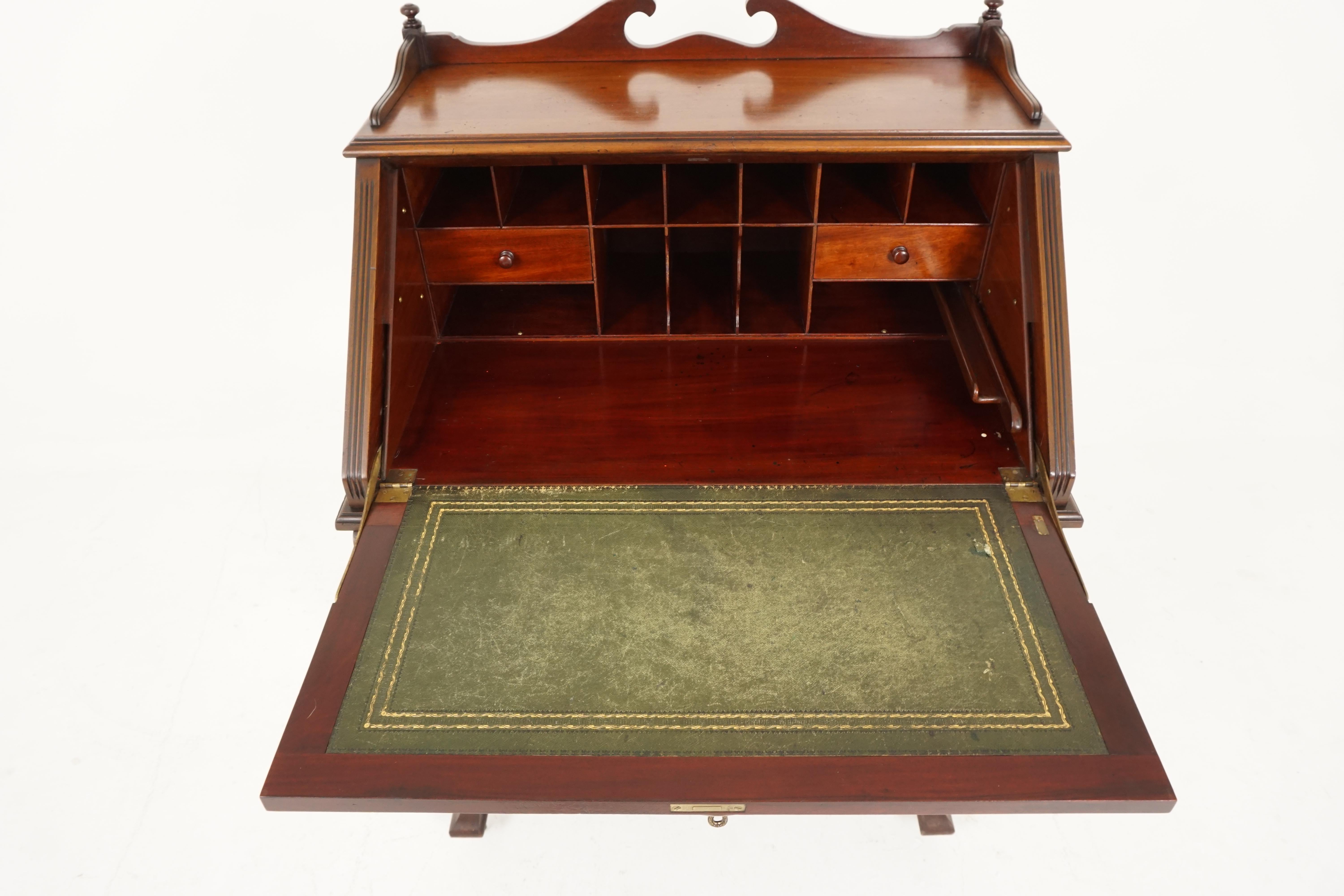 Antique walnut writing desk, Arts & Crafts fall front desk, Scotland 1910, H173

Scotland 1910
Solid walnut
Original finish
Three quarter gallery with finials
Carved detail lid with panels
Brass handle pulls down the lid and a framed support