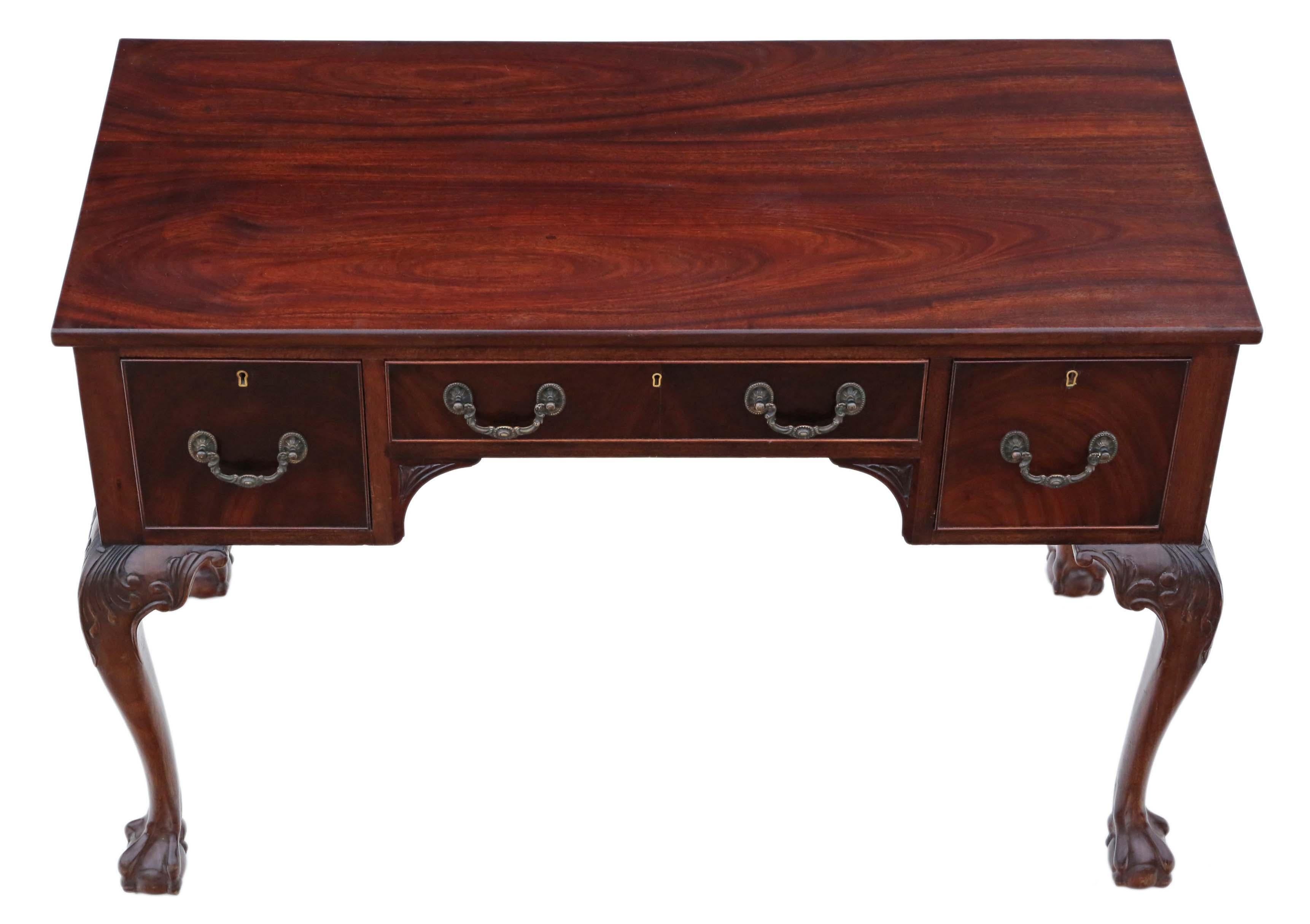 Antique fine quality C1910 mahogany writing desk or dressing table. Stamped W.FOWKES.

Solid heavy, no loose joints and no woodworm. Full of age, character and charm. The drawers slide freely. A rare and attractive quality find.

Would look