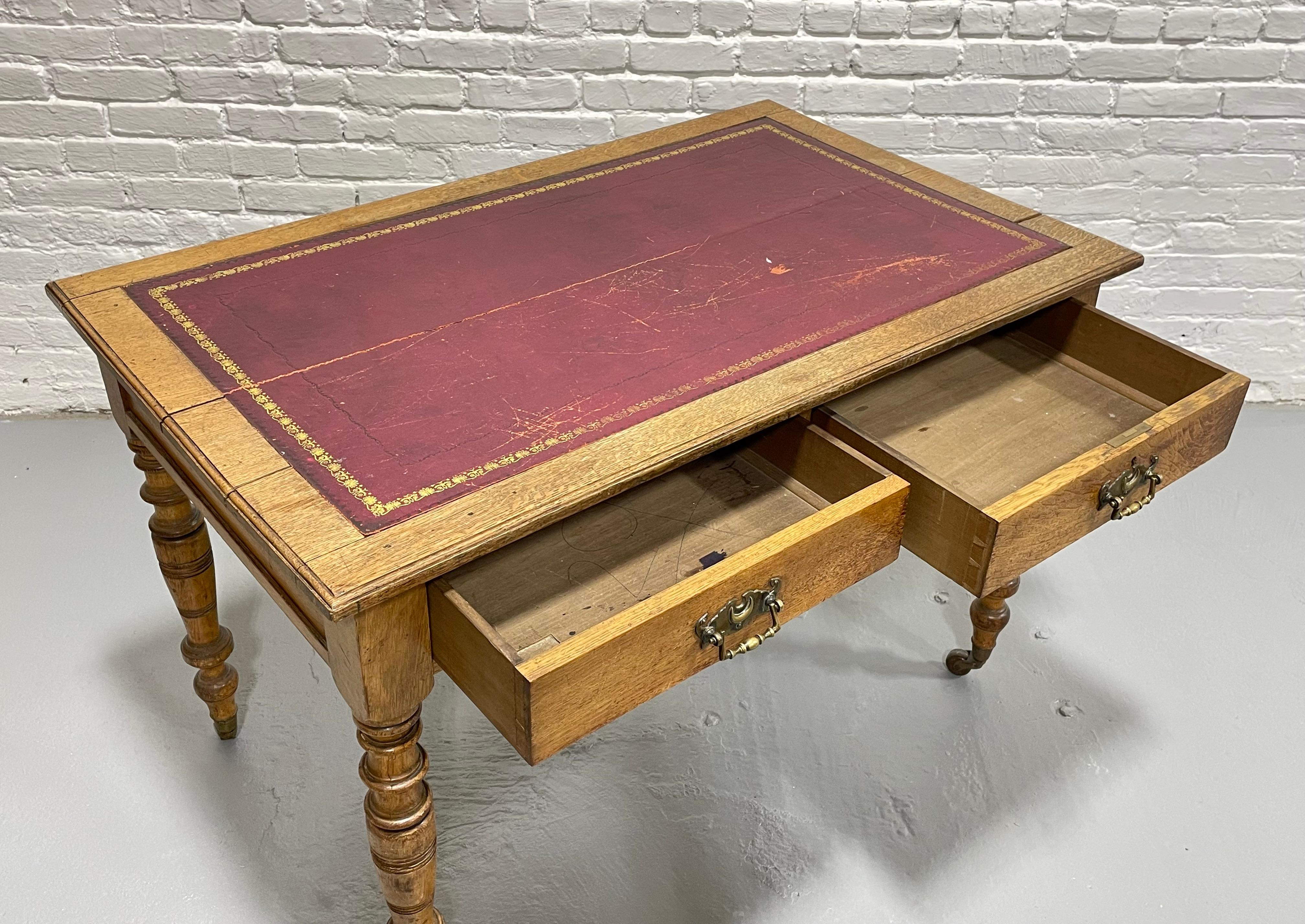 Antique Mahogany Writing Table / Desk Turned Legs Wheels, c. 1890 In Good Condition In Weehawken, NJ