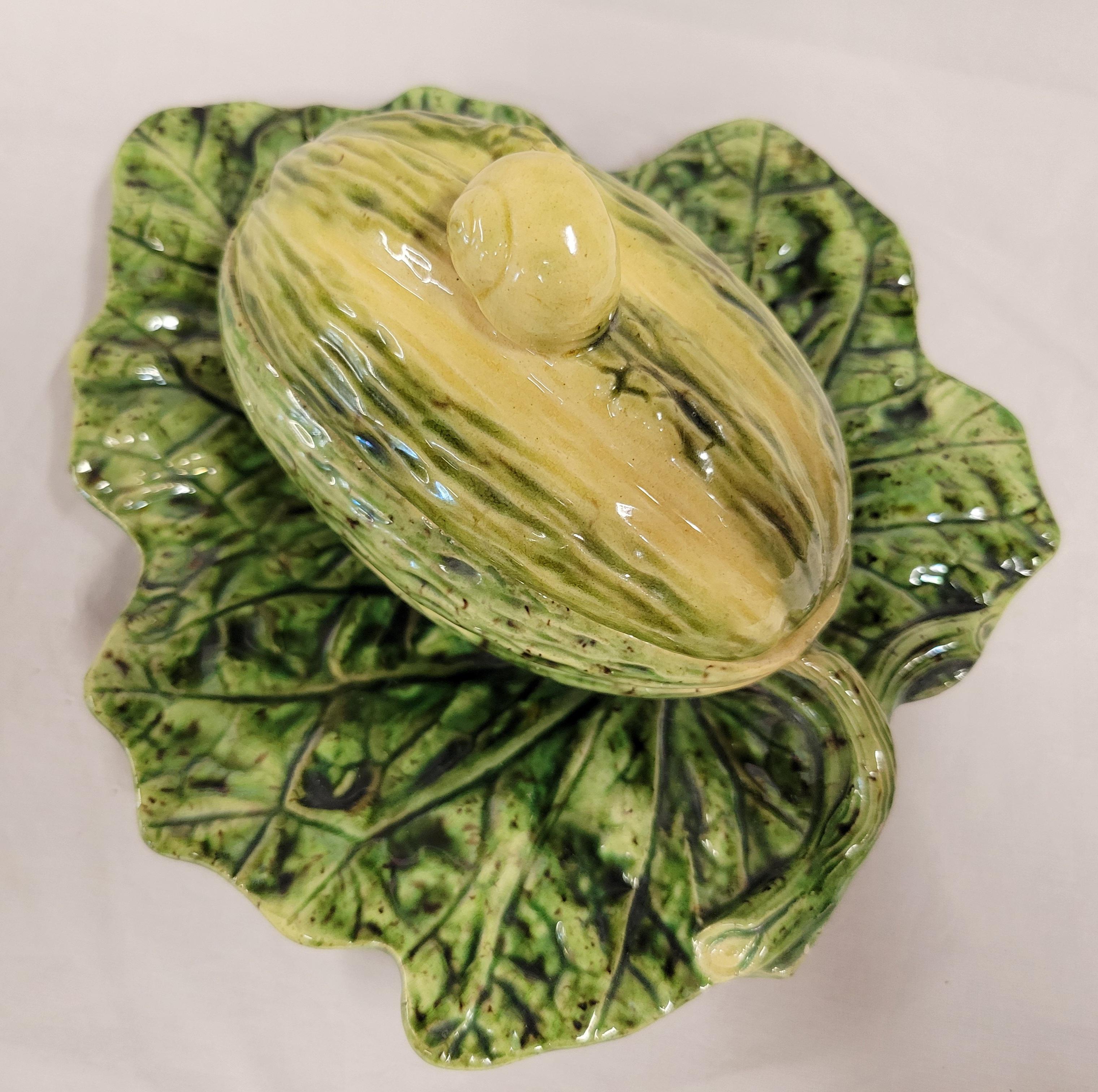 A gorgeous antique art nouveau 1920s or 1930s lidded melon dish which is attached to a leaf plate. The craftsmanship of this piece is outstanding though it does not bear maker's marks. It is of the quality and characteristics of French