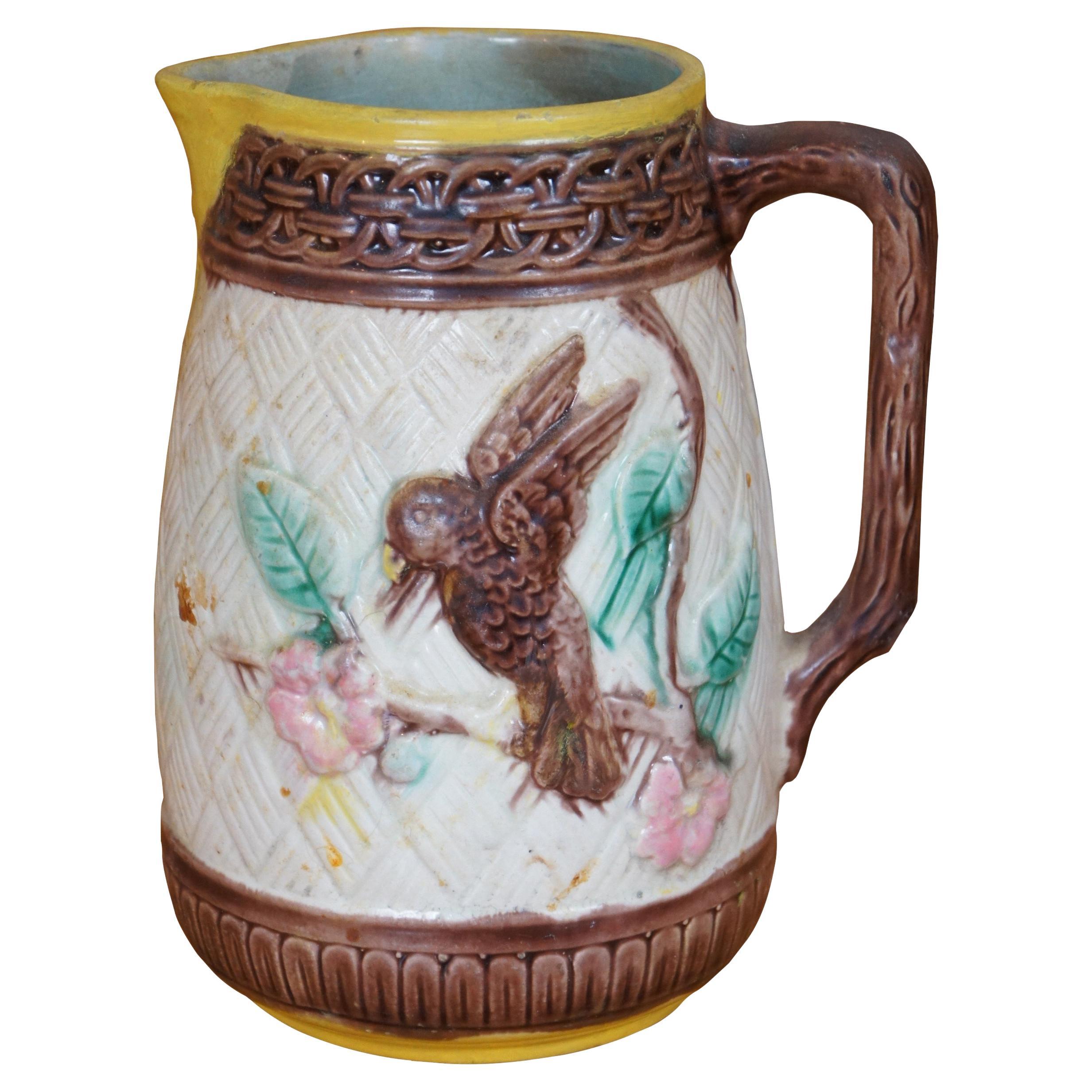 Antica brocca in maiolica Parrot Bird Dogwood Flower Basketweave 7"