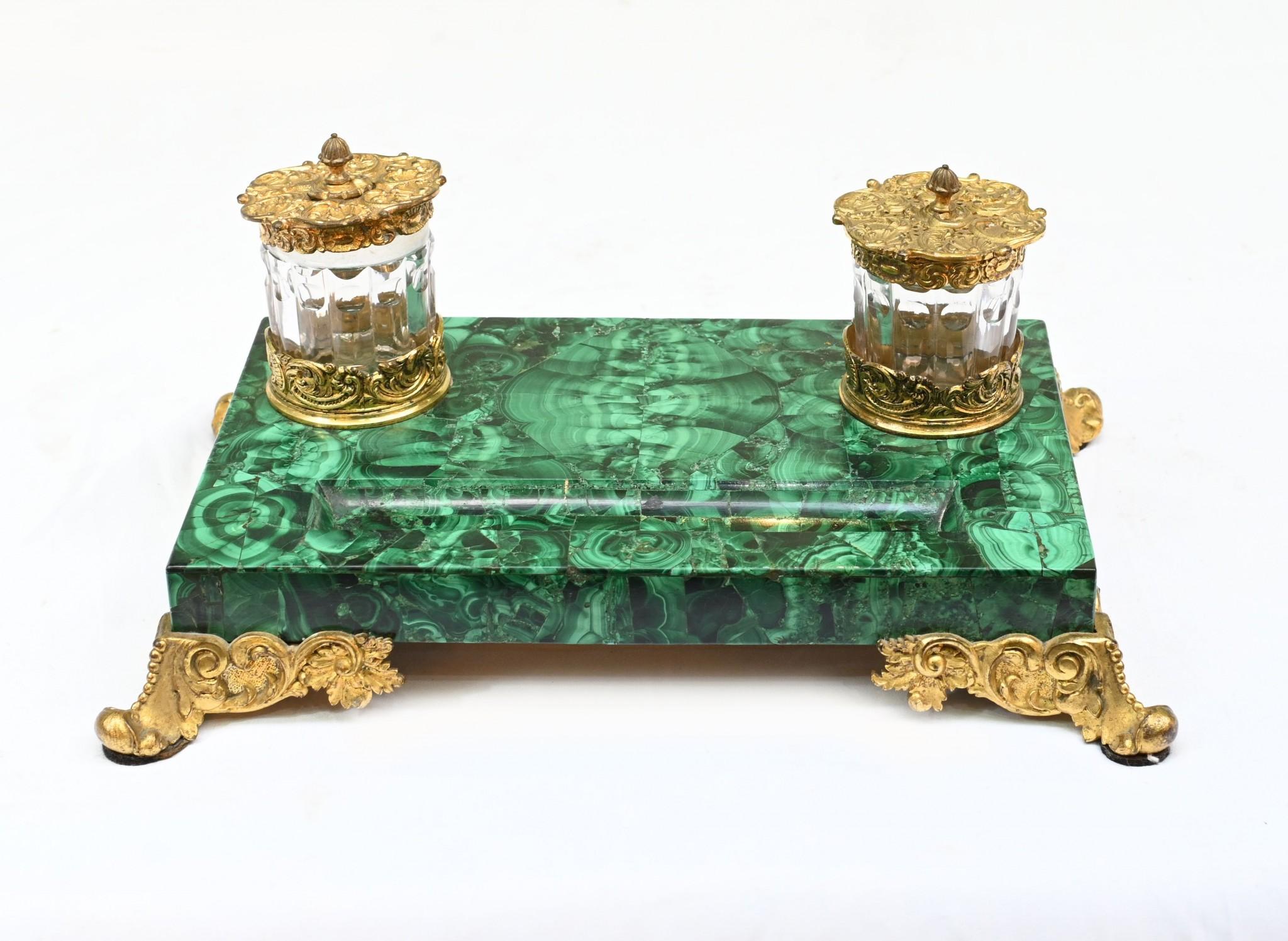 Gorgeous French malachite desk inkwell set
Love the colour and grain to the malachite which really stands out
The gilt fixtures are original and very well cast with great patina
Comes with the two glass ink pots
Circa 1880
We purchased this from a