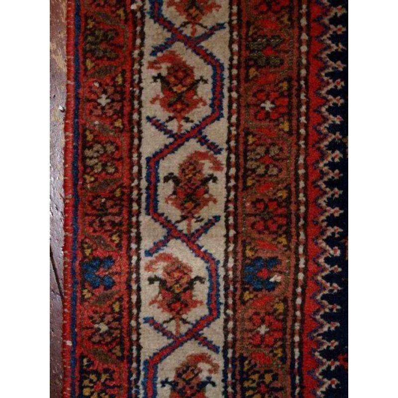 The runner has excellent colour in a vivid red and an ivory ground border which frames the runner well.

The runner is in excellent condition with slight even wear and good pile. Hand washed and ready for use or display. The runner is suitable for