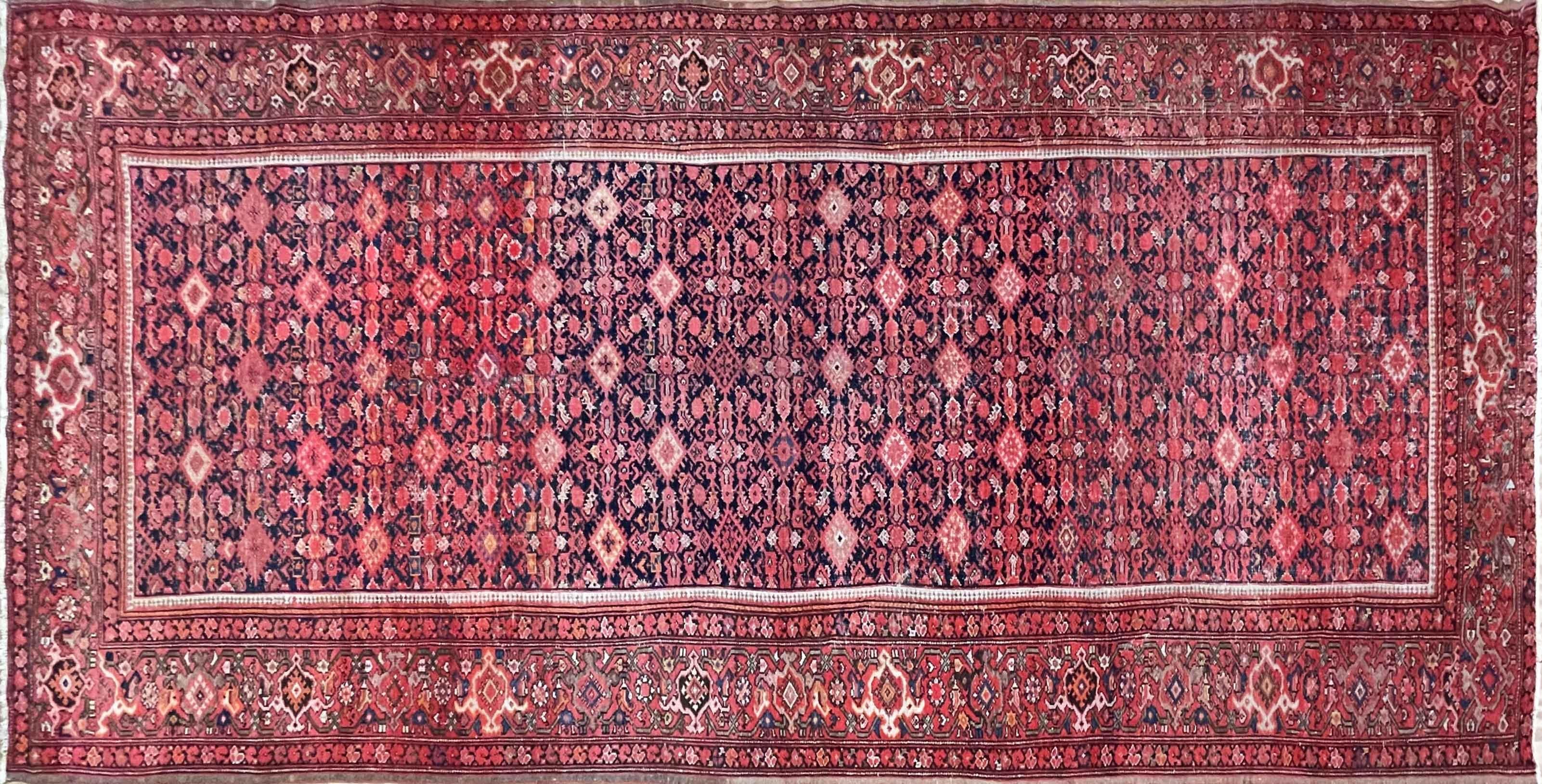 The tribal weavers in Malayer were often Turkish, and they employed the Turkish knot. The Gourde is a symmetrical knot, as opposed to the asymmetrical knot of many traditionally  creations. Additionally, antique Malayer rugs regularly enjoy a low