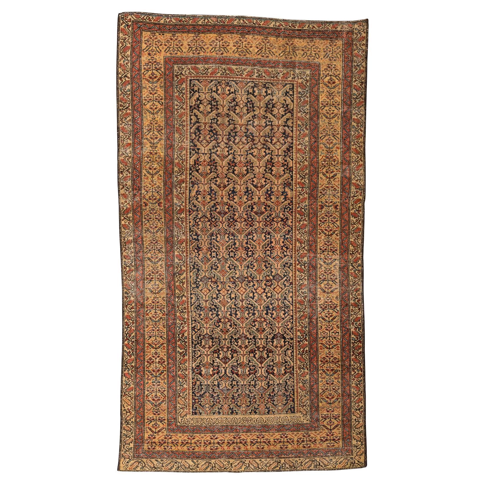 Alfombra antigua Malayer de lana camel, índigo y coral