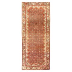 Tapis ancien (a Gallery Gallery) en laine rouge et crème