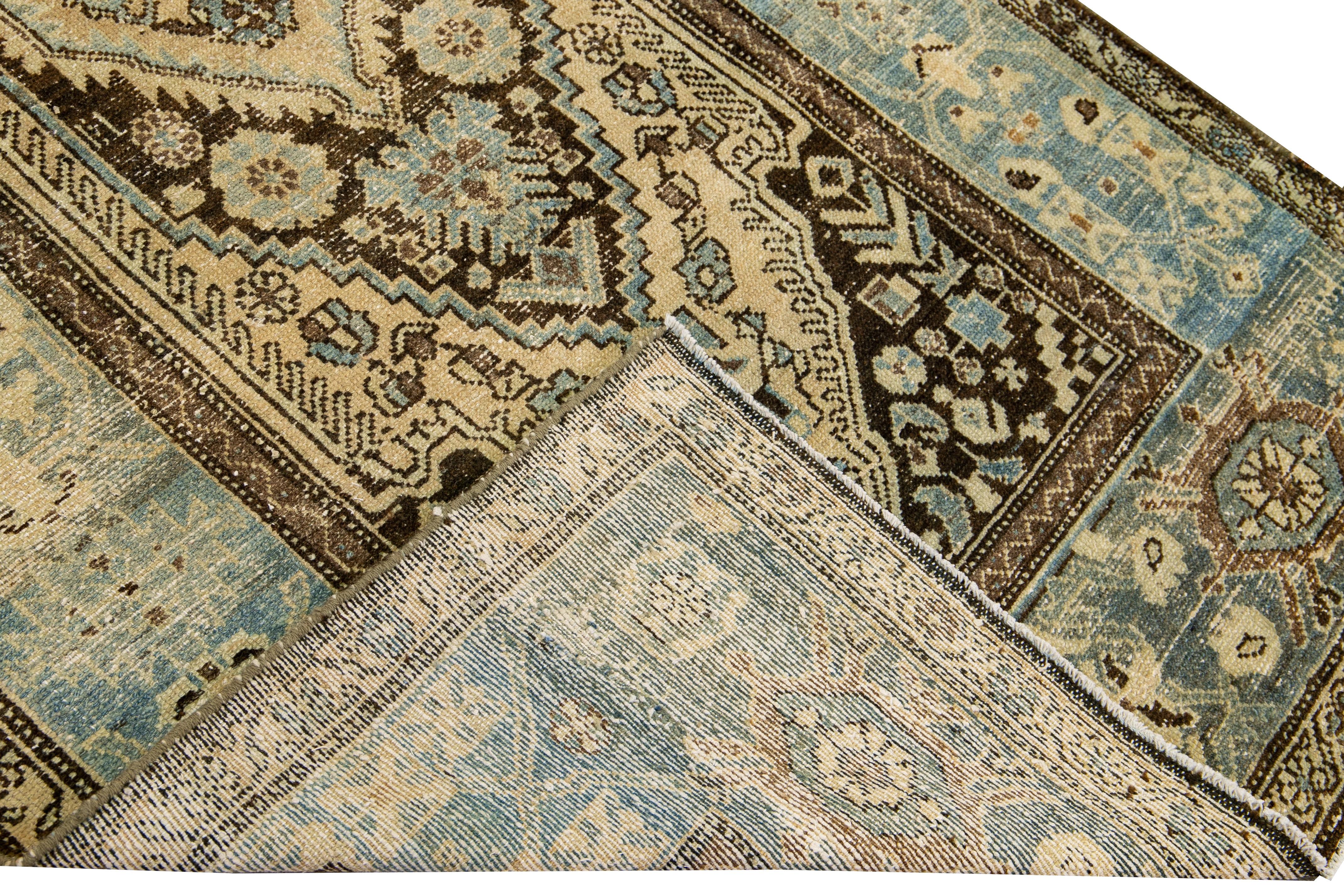Beautiful antique Malayer hand-knotted wool rug with a beige field. This Malayer piece has a blue frame and brown accent in a gorgeous all-over Medallion design.

This rug measures: 4'2