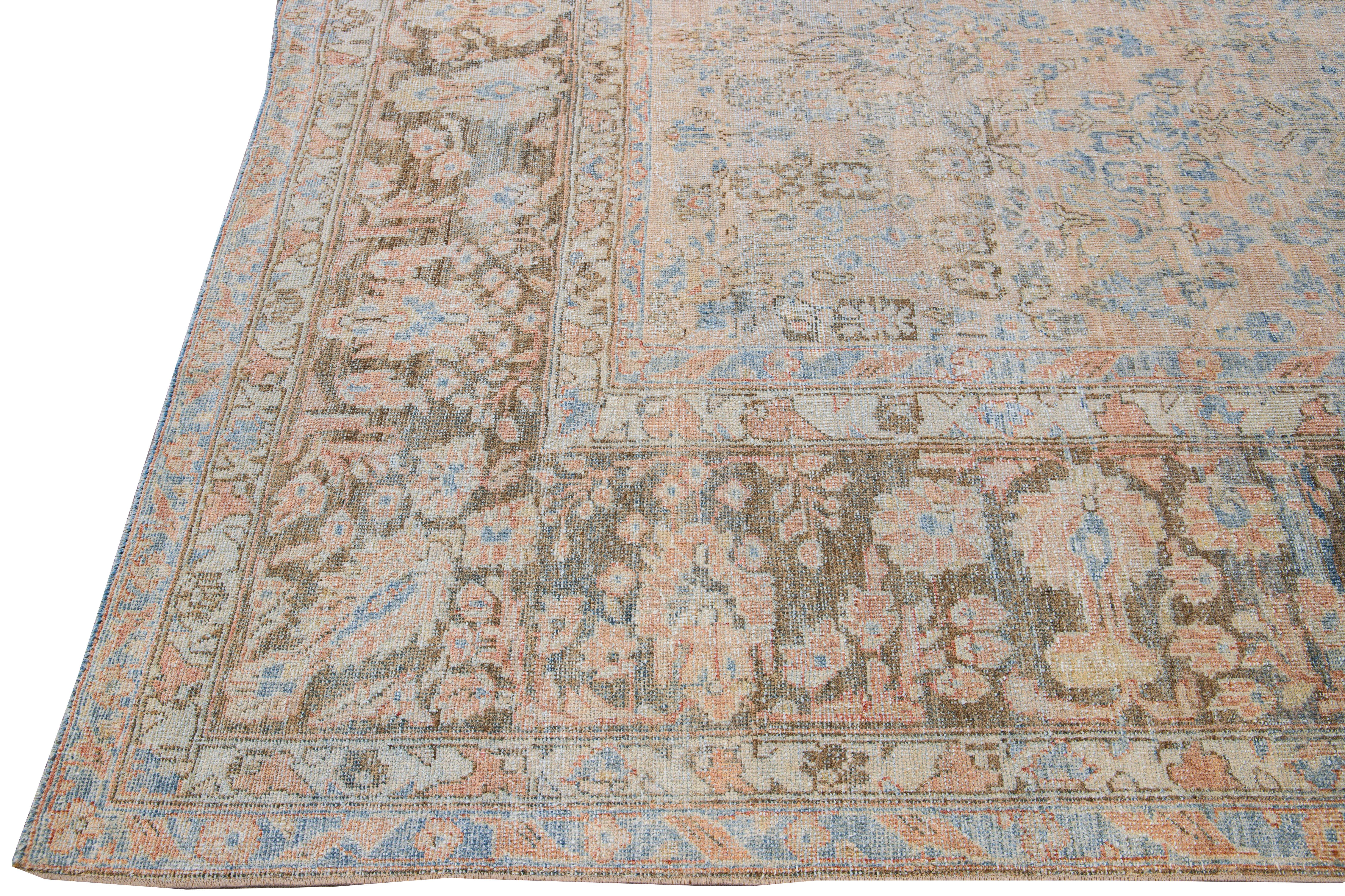 Persian Antique Malayer Handmade Blue and Peach Floral Wool Rug For Sale