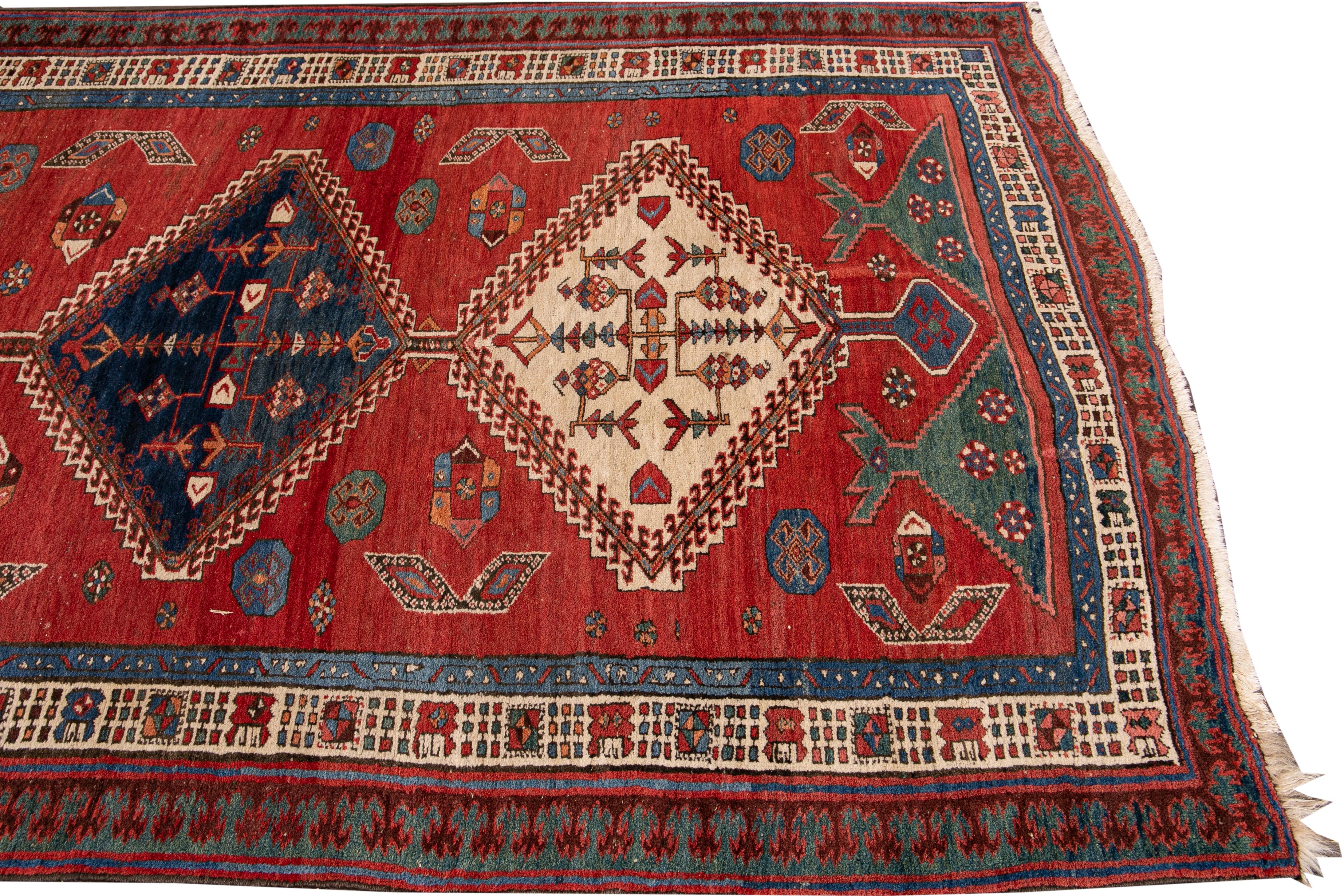 Persian Antique Serapi Handmade Red Tribal Wool Runner For Sale