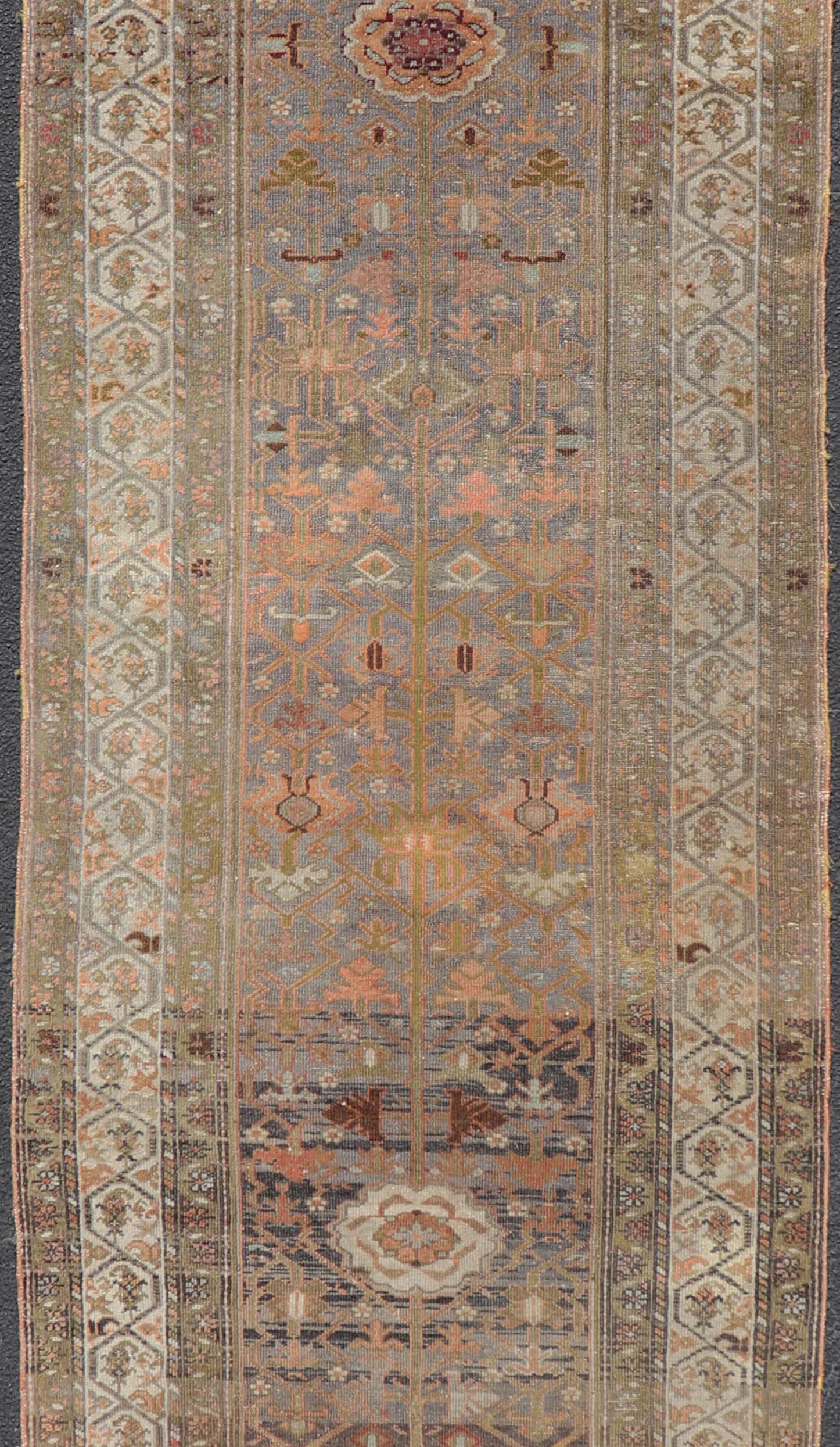 Distressed antique long Persian Malayer runner with all-over intricate floral design in multi-colors, rug R20-1109, country of origin / type: Iran / Malayer, circa 1910

Measures: 3'6 x 20'

This antique Persian Malayer runner, circa early 20th